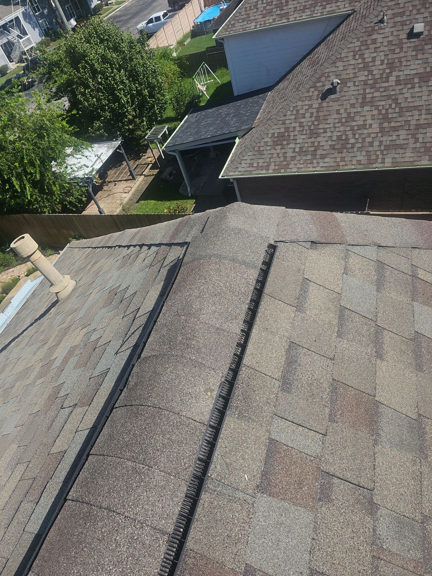 Hail Damage using Owen's Corning Duration (Lifetime) Shingles by Roof Repair Company