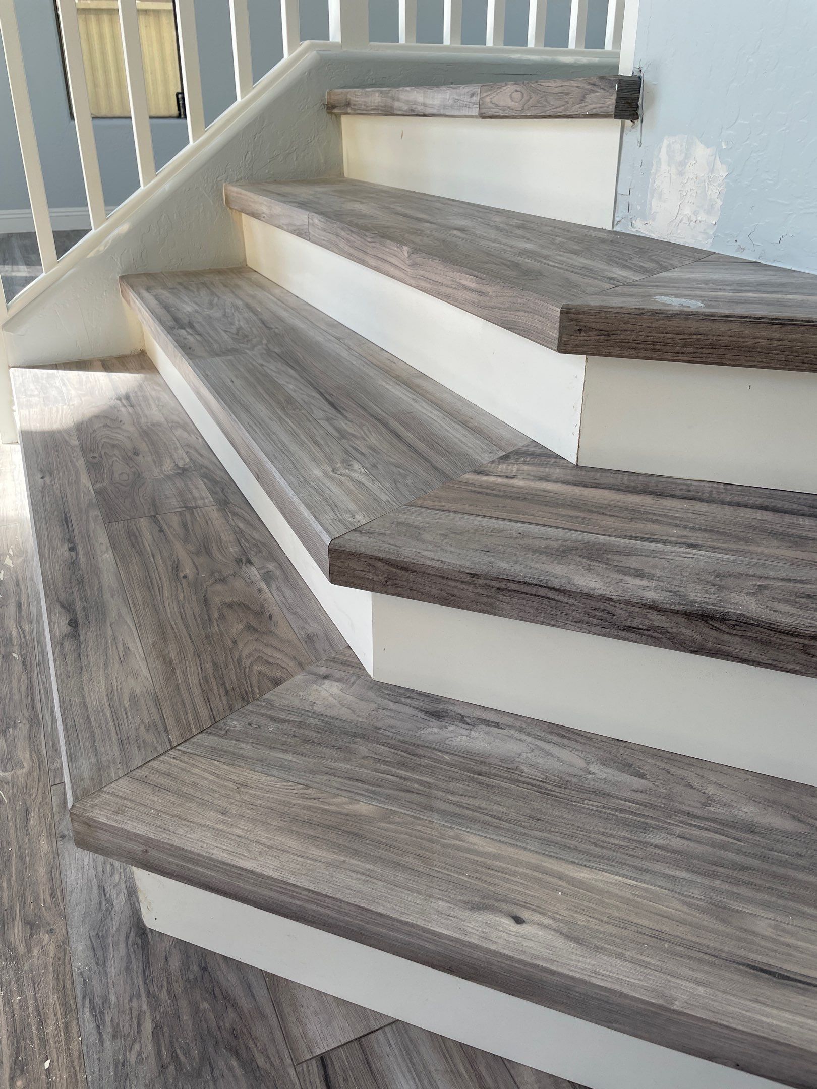Laminate Staircase and Flooring  by Footprints Floors of Chandler 