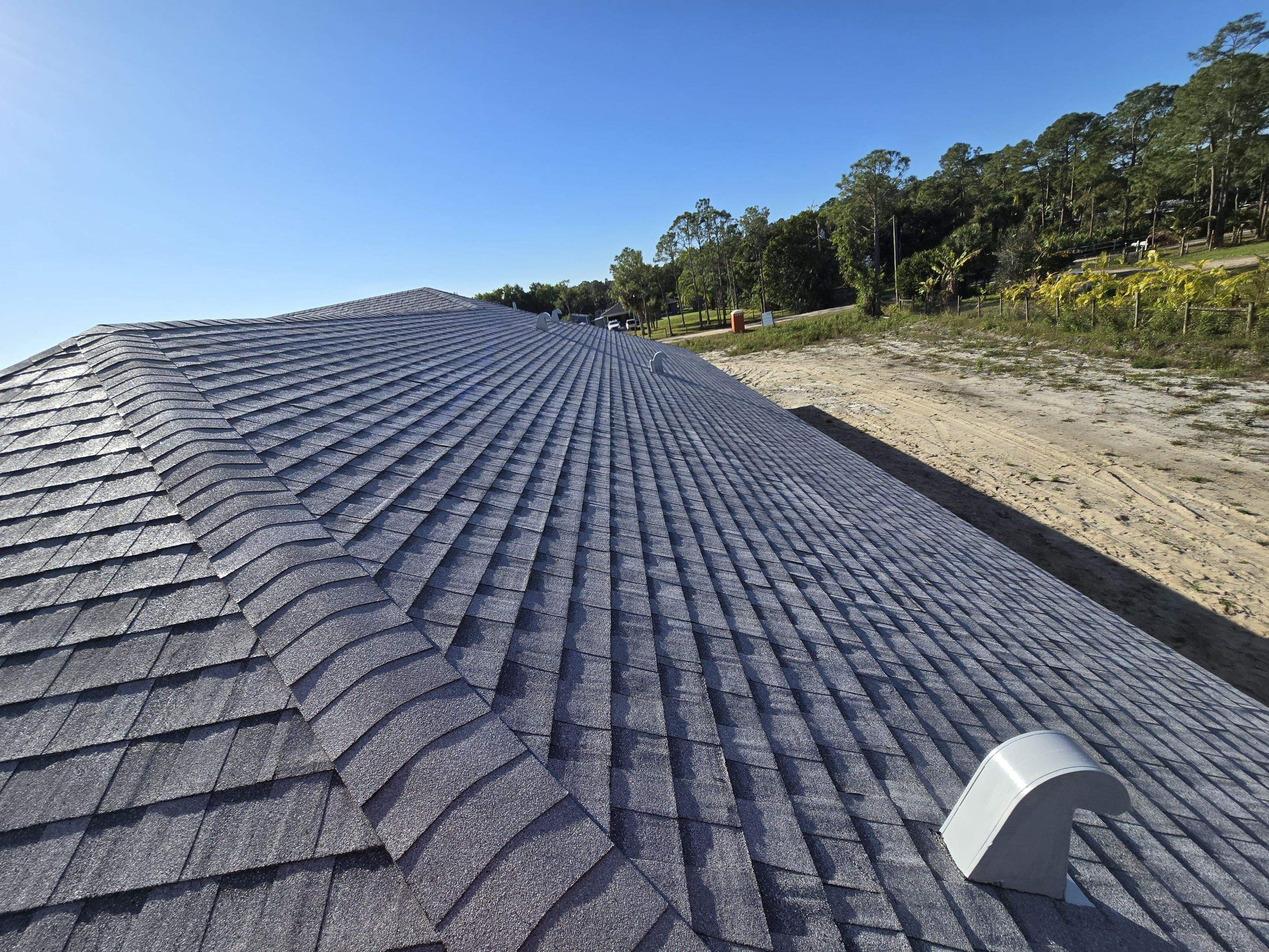 Tamko Heritage Glacier White by Total Roofing System The Metal Roof Experts