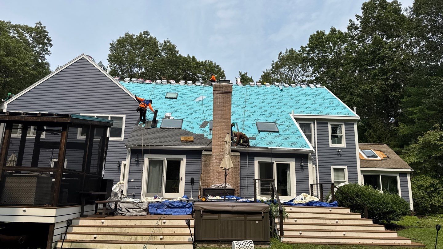 Solar-Ready Roof Replacement with GAF Pewter Gray Shingles & VELUX Skylights by Sensible Home Solutions