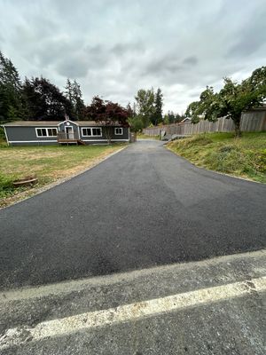 Joann | Asphalt Driveway & Retaining Wall