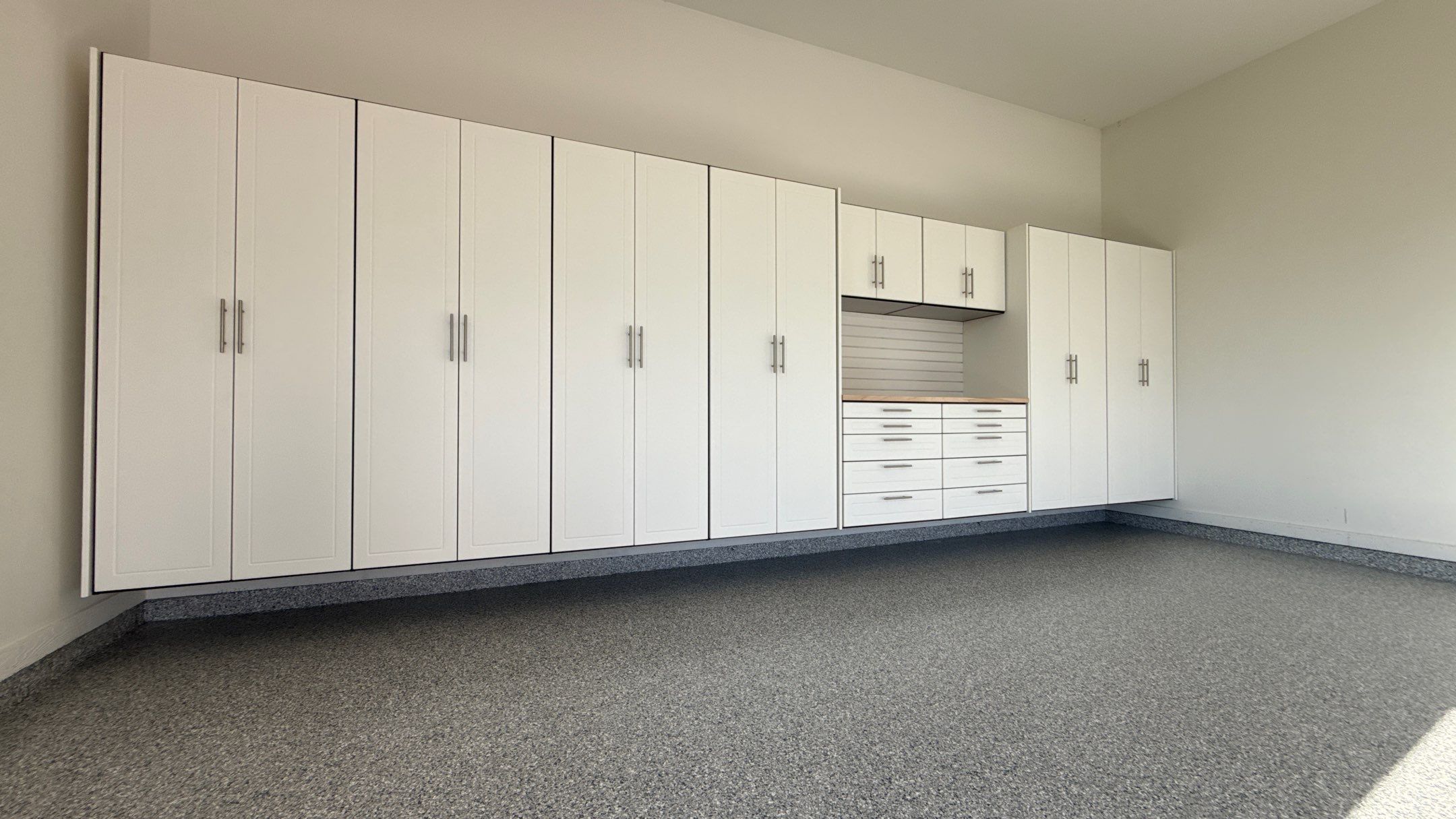 Garage Remodel with Custom Cabinets and Epoxy Floors in Overland Park by Banner Garage