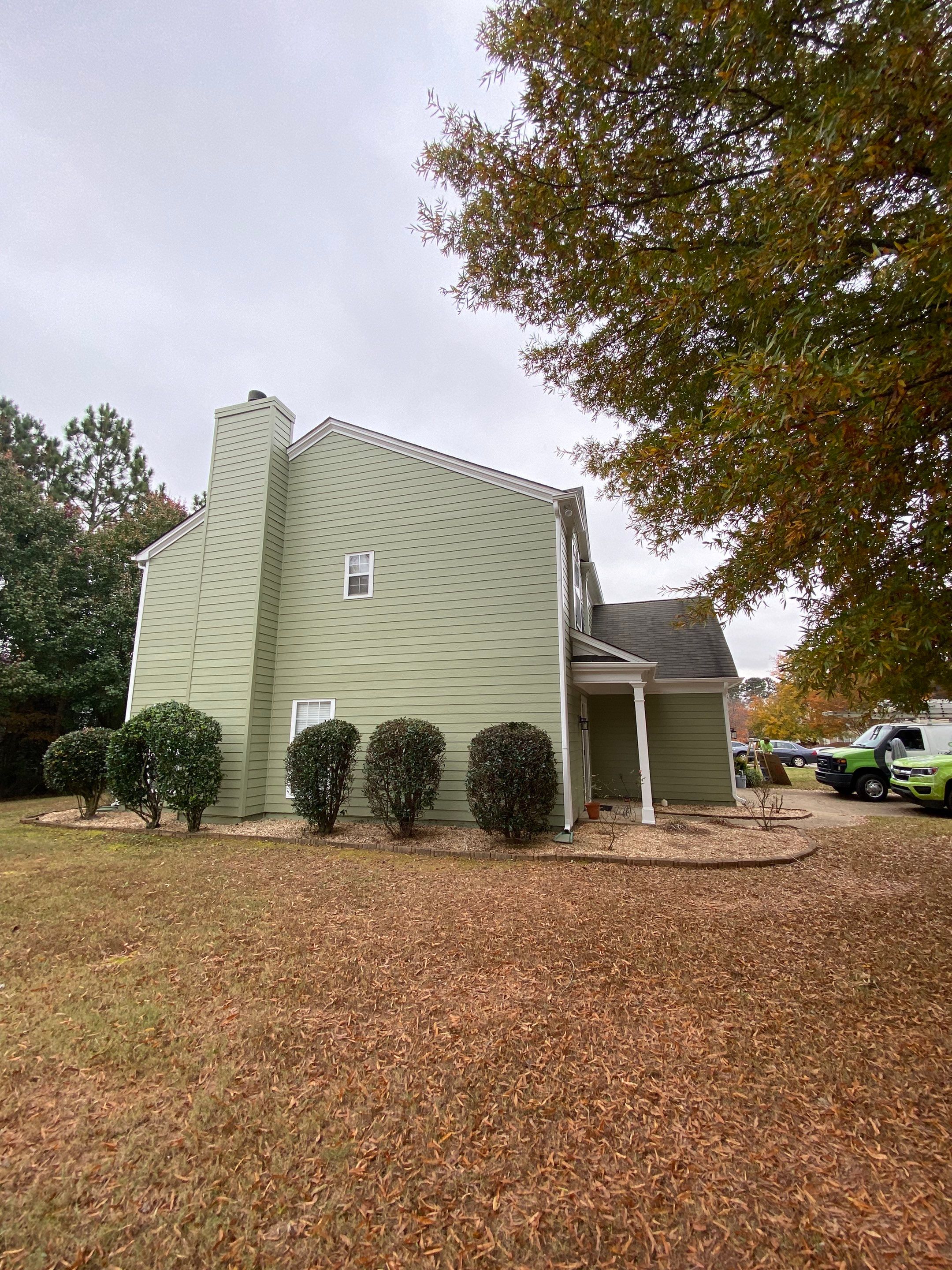 Exterior Painting for a Two-Story Sage Green Home in Kennesaw by Swift Home Renovations