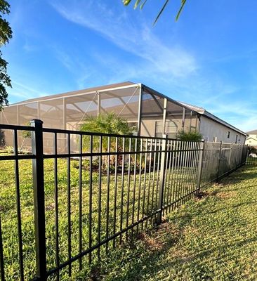 Aluminum Fence Installation using Black 3 Rail Aluminum Fence