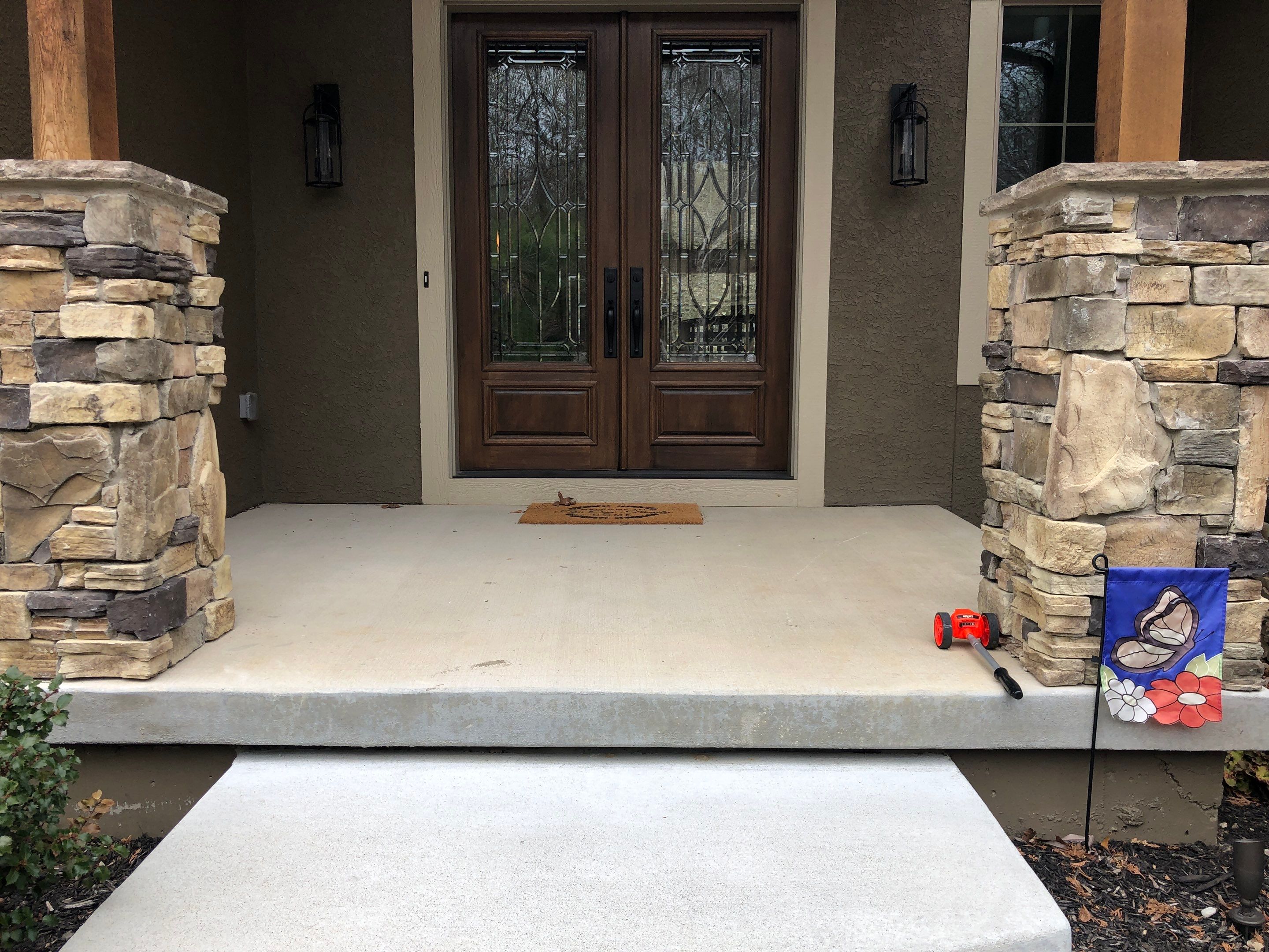 Lenexa, KS -- Front Stoop Before and After Tuscan Overlay by Big Red Decorative Concrete, LLC