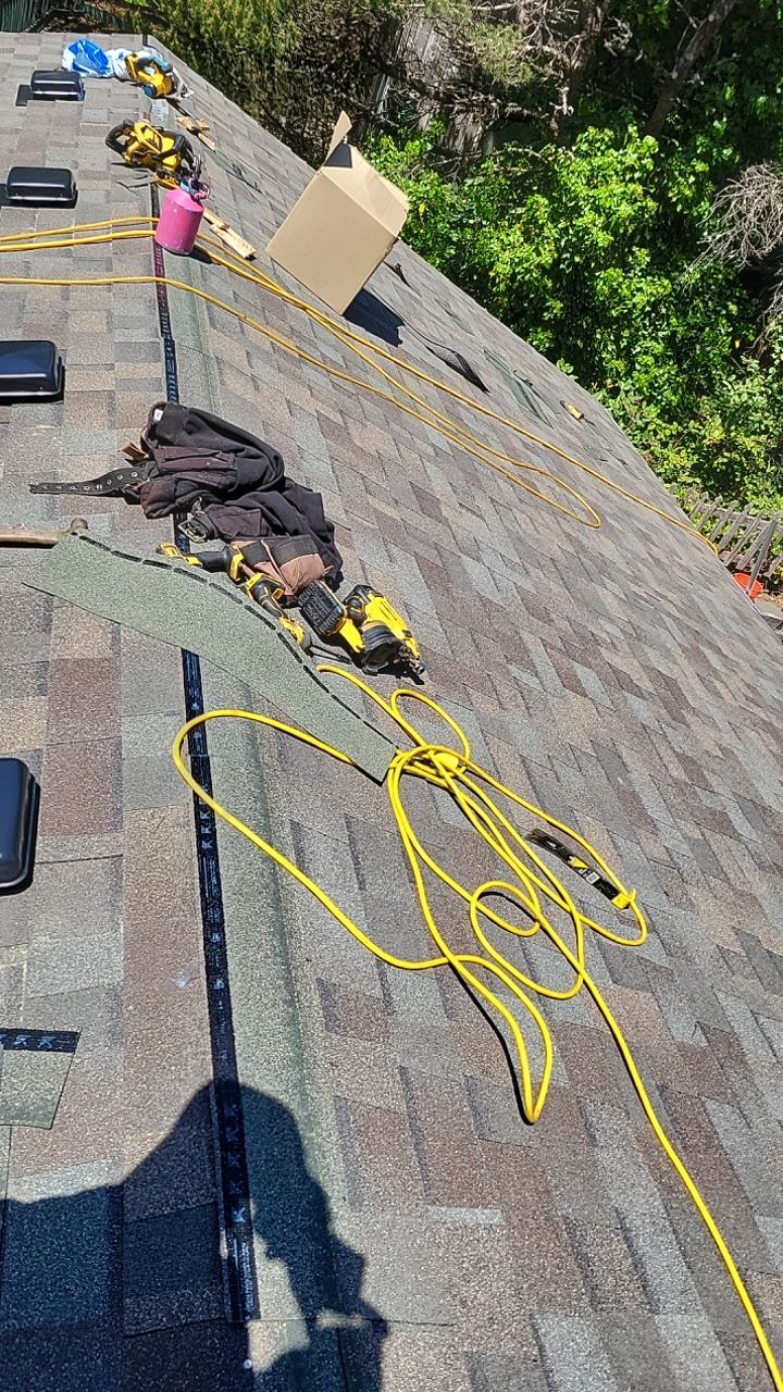 Residential Roofing Installation using Malarkey Highlander with GAF 60mil TPO by Orezona Building & Roofing Company, Inc.