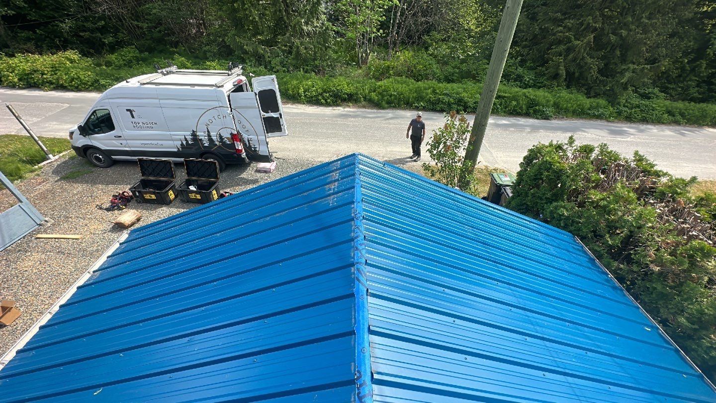 Residential ReRoofing Installation using Duraclad 26ga by Top Notch Roofing Inc