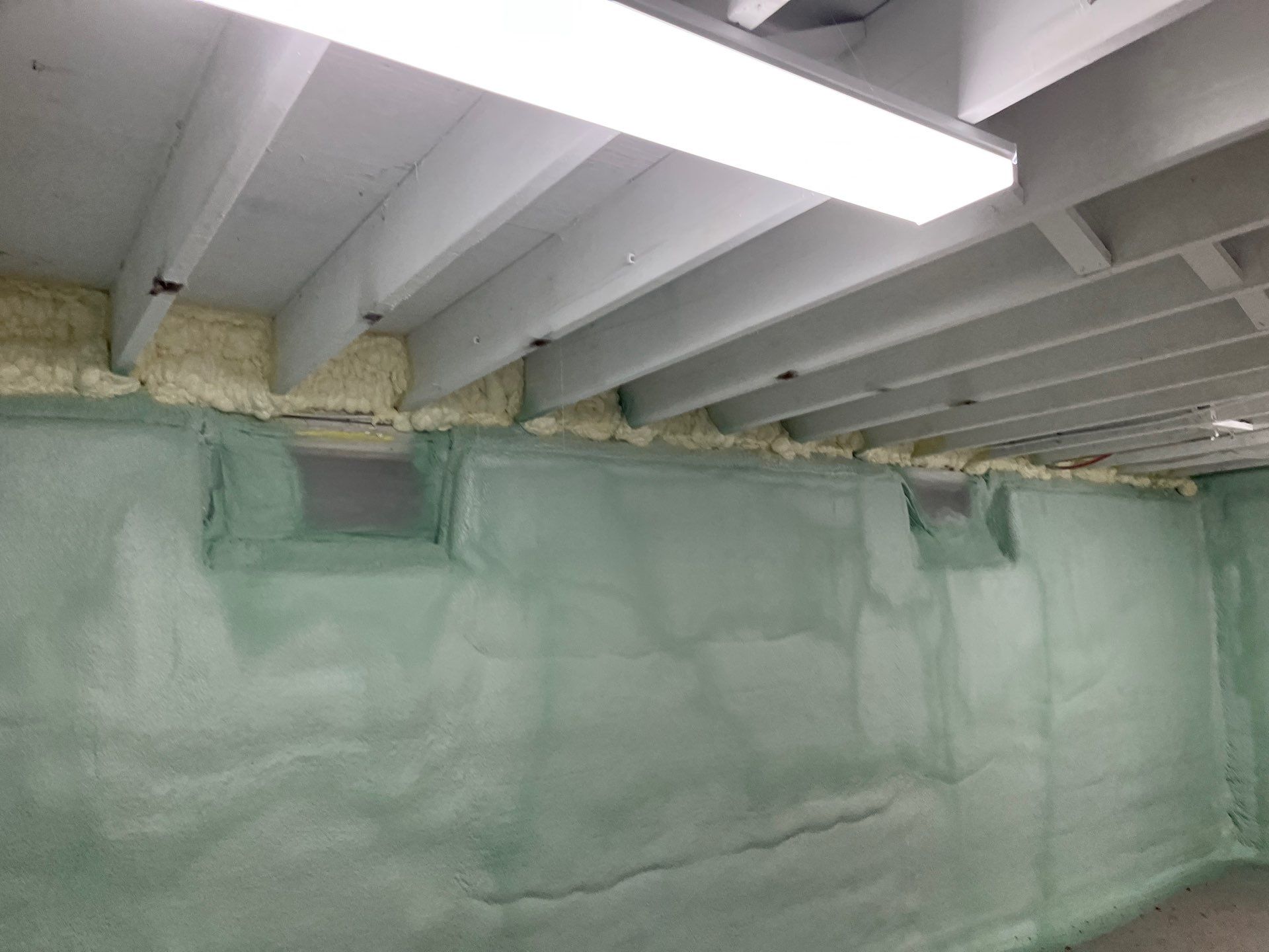 Basement Exterior Walls using Closed Cell Spray Foam by NYS Foam & Energy