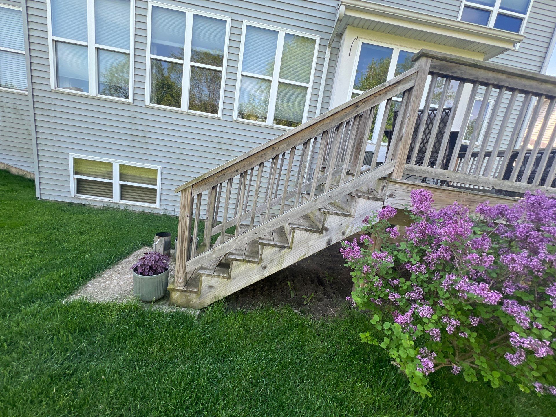 wood deck cleaning and staining by Northern Power Washing LLC.