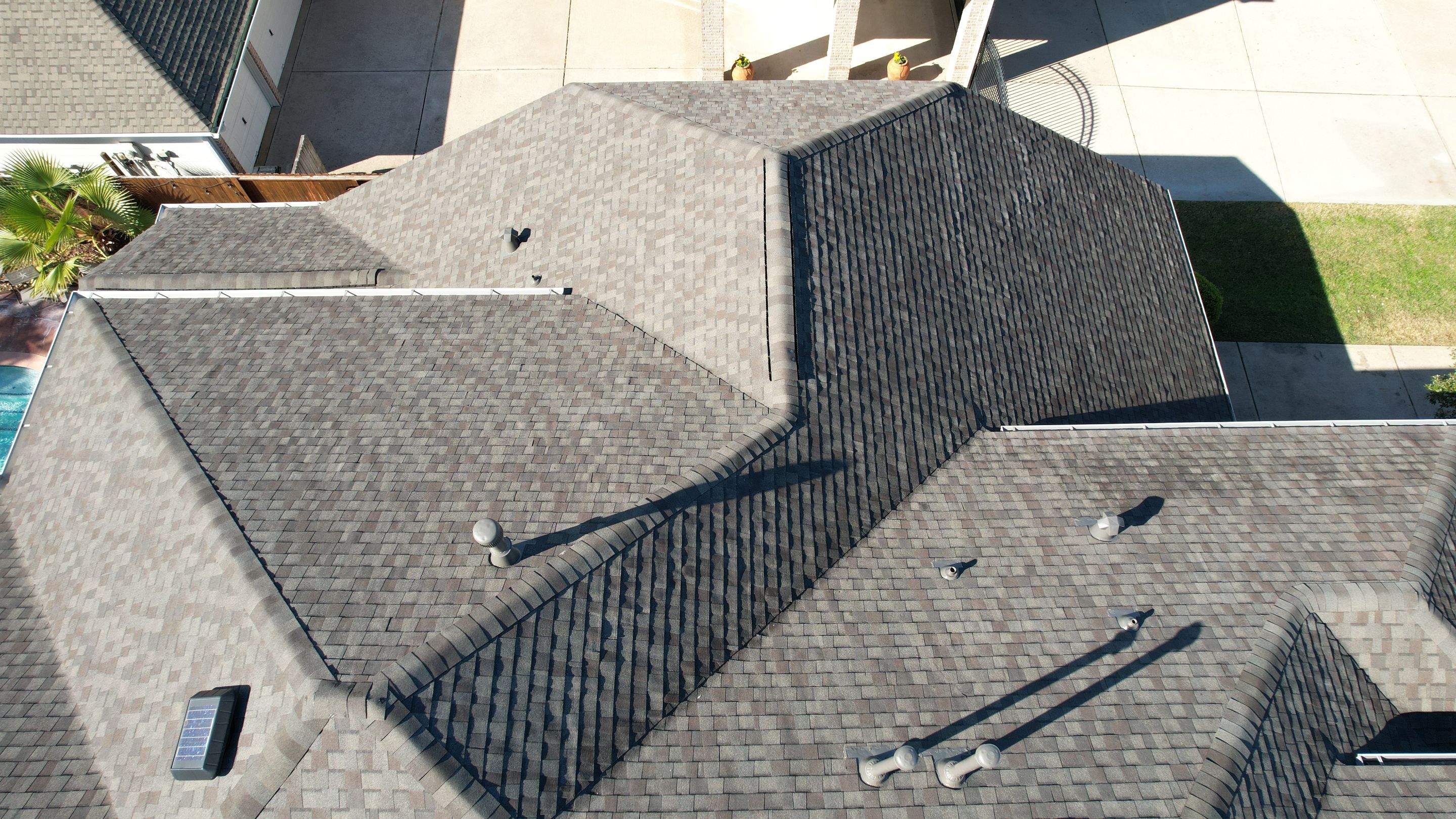 Two-Story Roof Replacement & Chimney Stucco Repair — Houston, TX by PL Roofing & SB Roofing, LLC.
