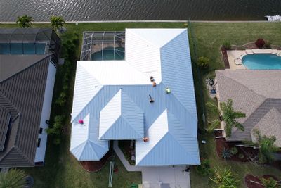 Residential Roofing Installation using Tri County Metal