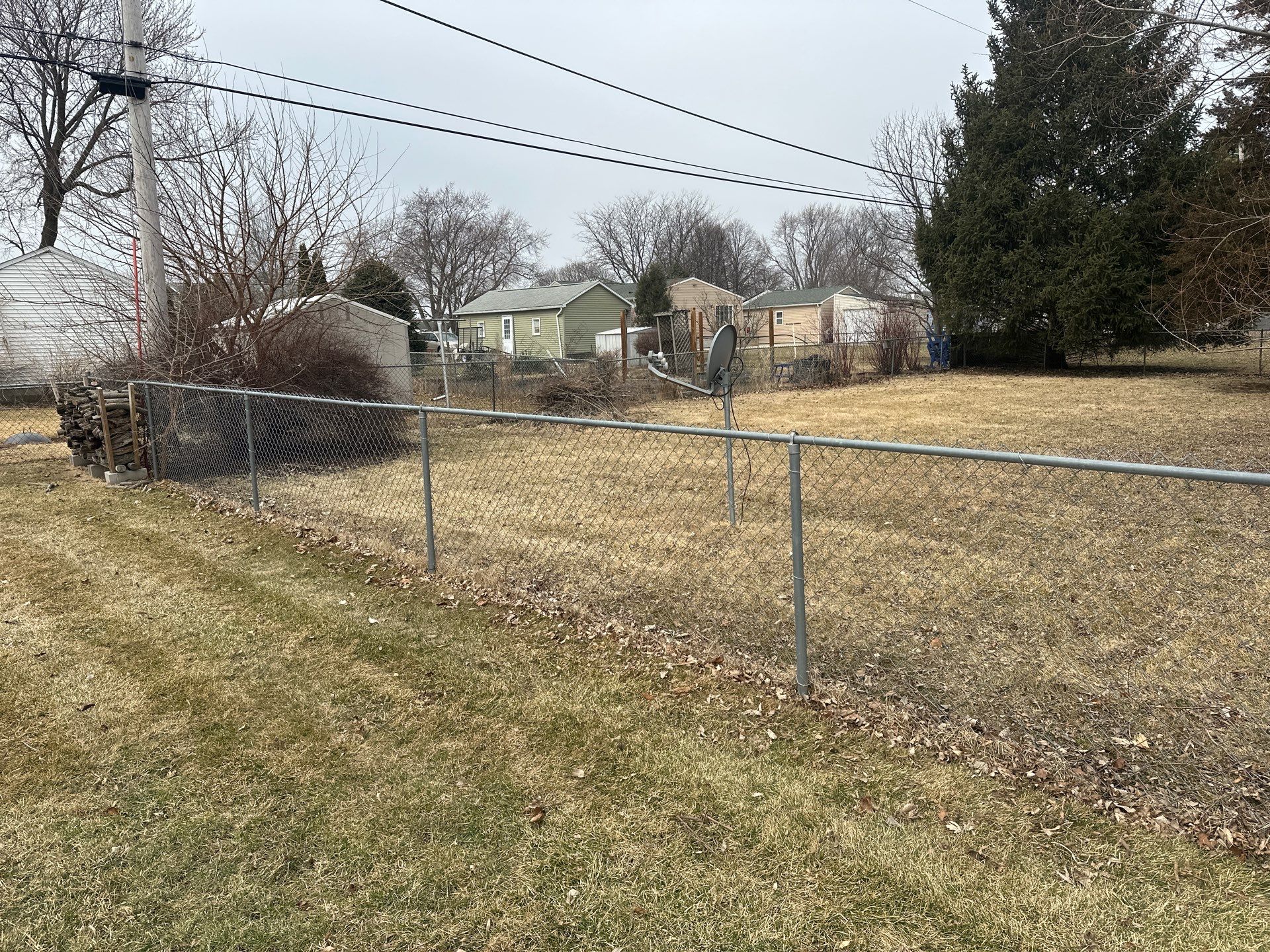 Galvanized Chain Link Fence and Vinyl Gate Installation in Washburn by Perfect Picket Fence and Stain