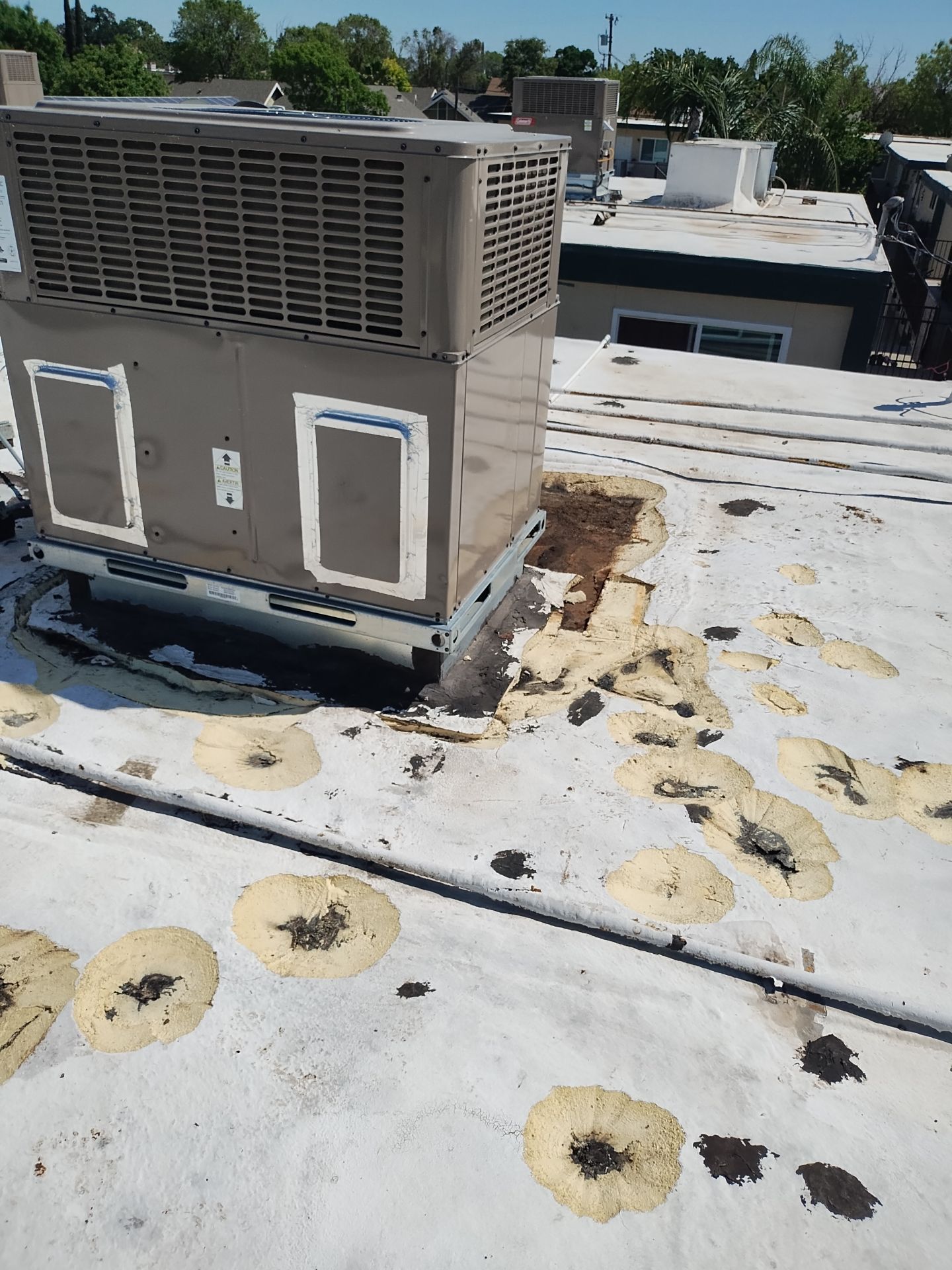 Foam Refurbish using General Coatings acrylic coatings and spray foam by Straight Edge Roofing Inc