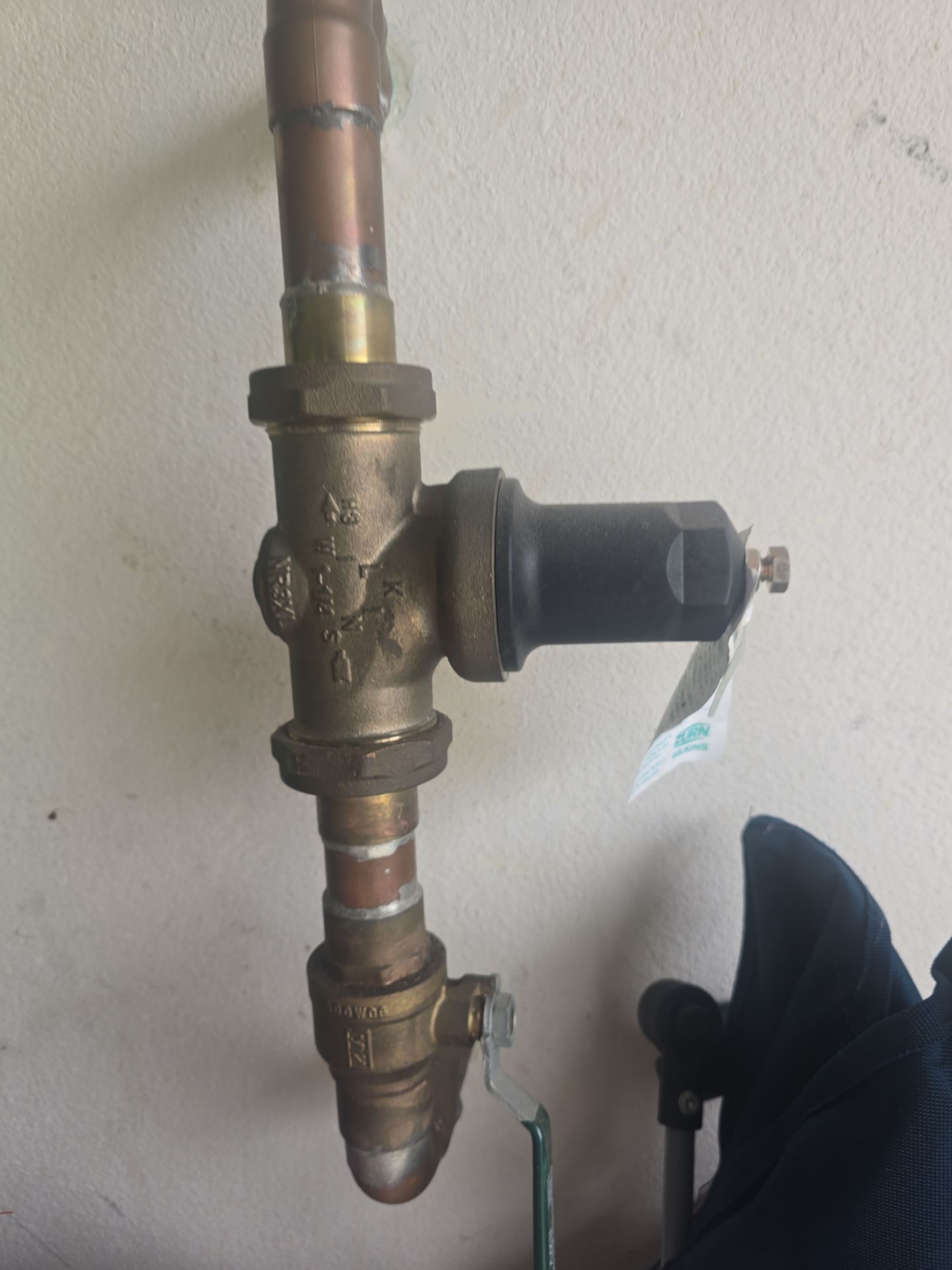 Fixing Water Leak by Us Plumbing
