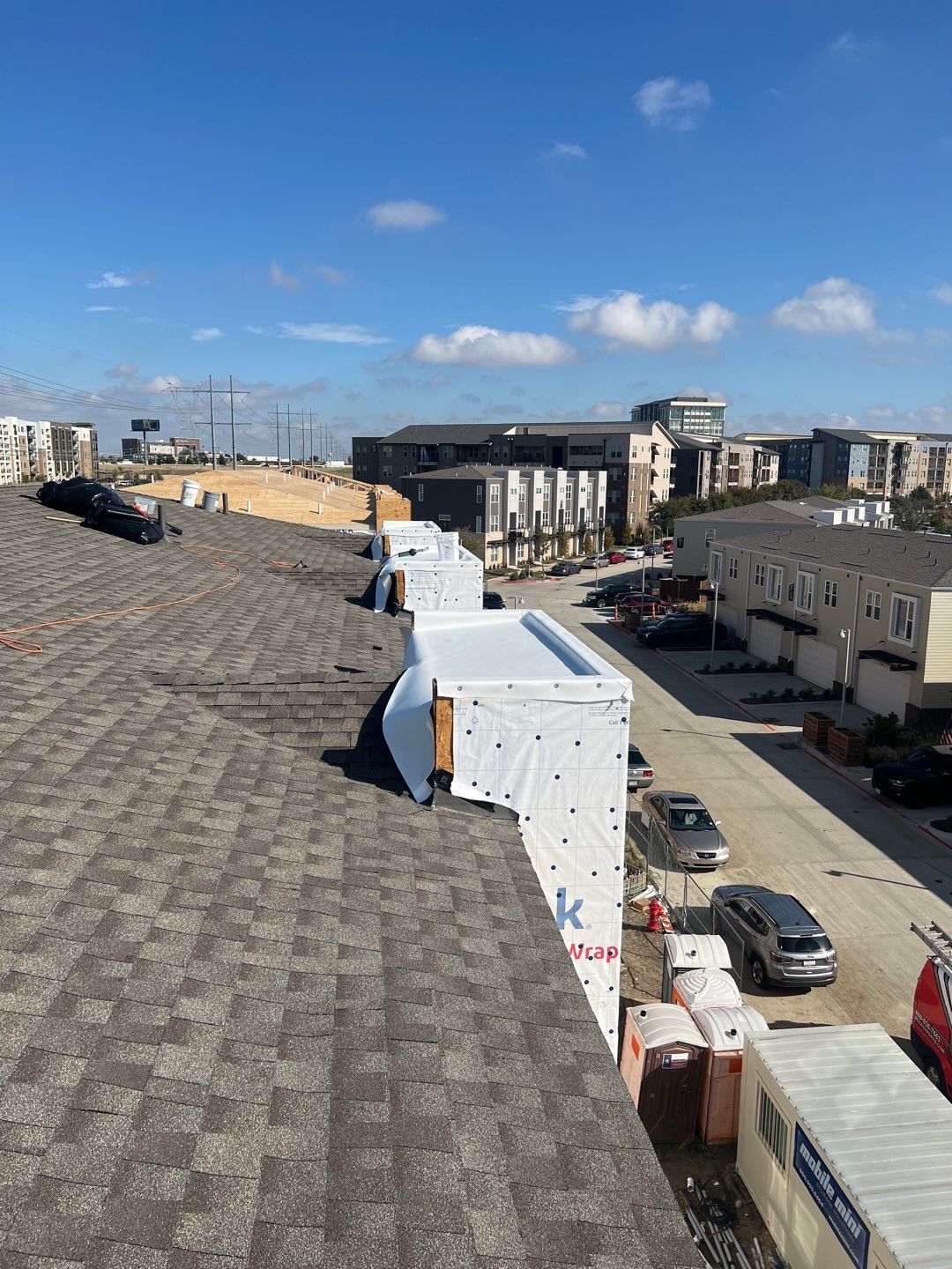 Apartment Roofing Installation using GAF HDZ Shingles, GAF TPO and Pavers in Lewisville, TX by Roof Experts