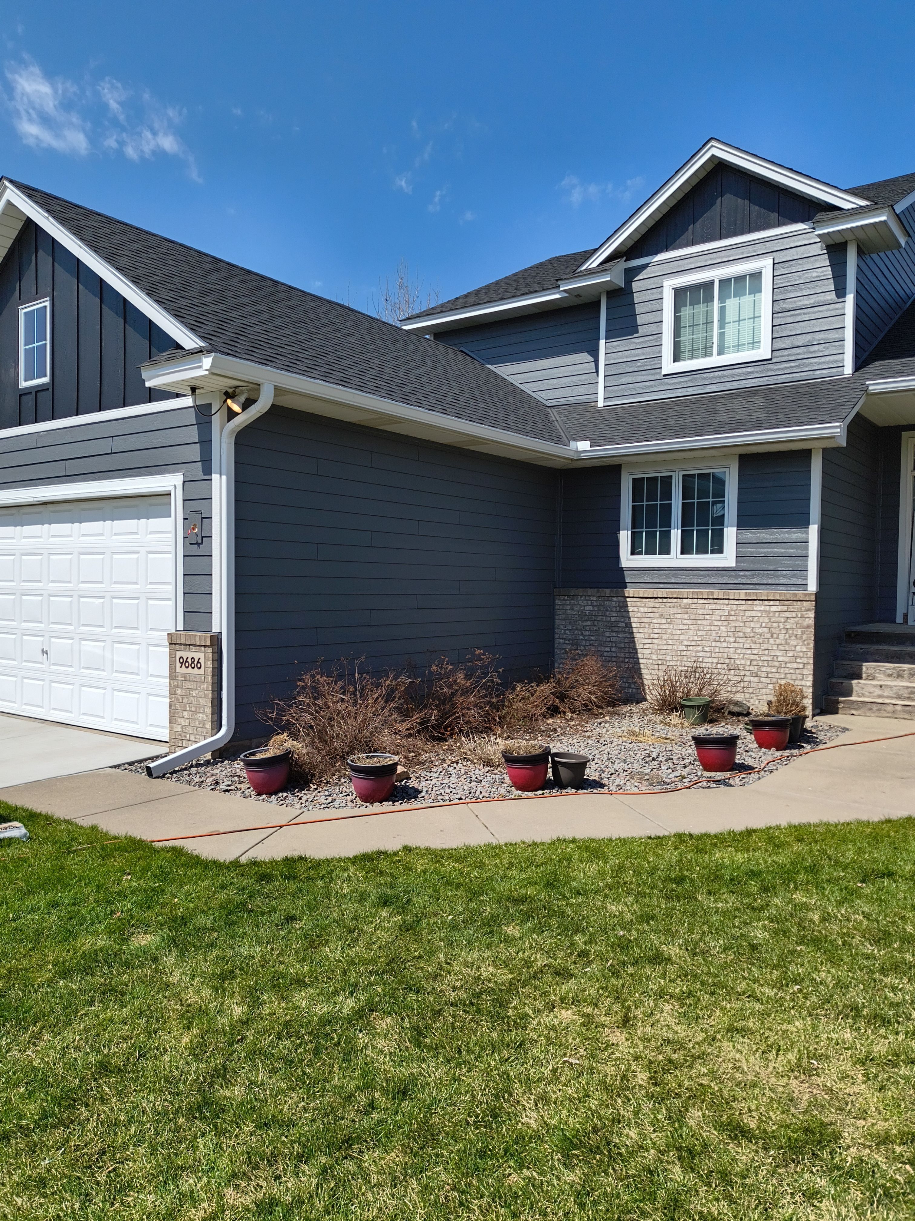 6” White Gutters & LeafBlaster Pro on 3-Story Home in St. Michael MN | by Next Level Seamless Gutters / Exteriors Inc.