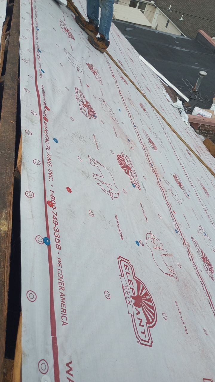 Commercial Roofing Installation using Performance Shingles by Mr. Roofer
