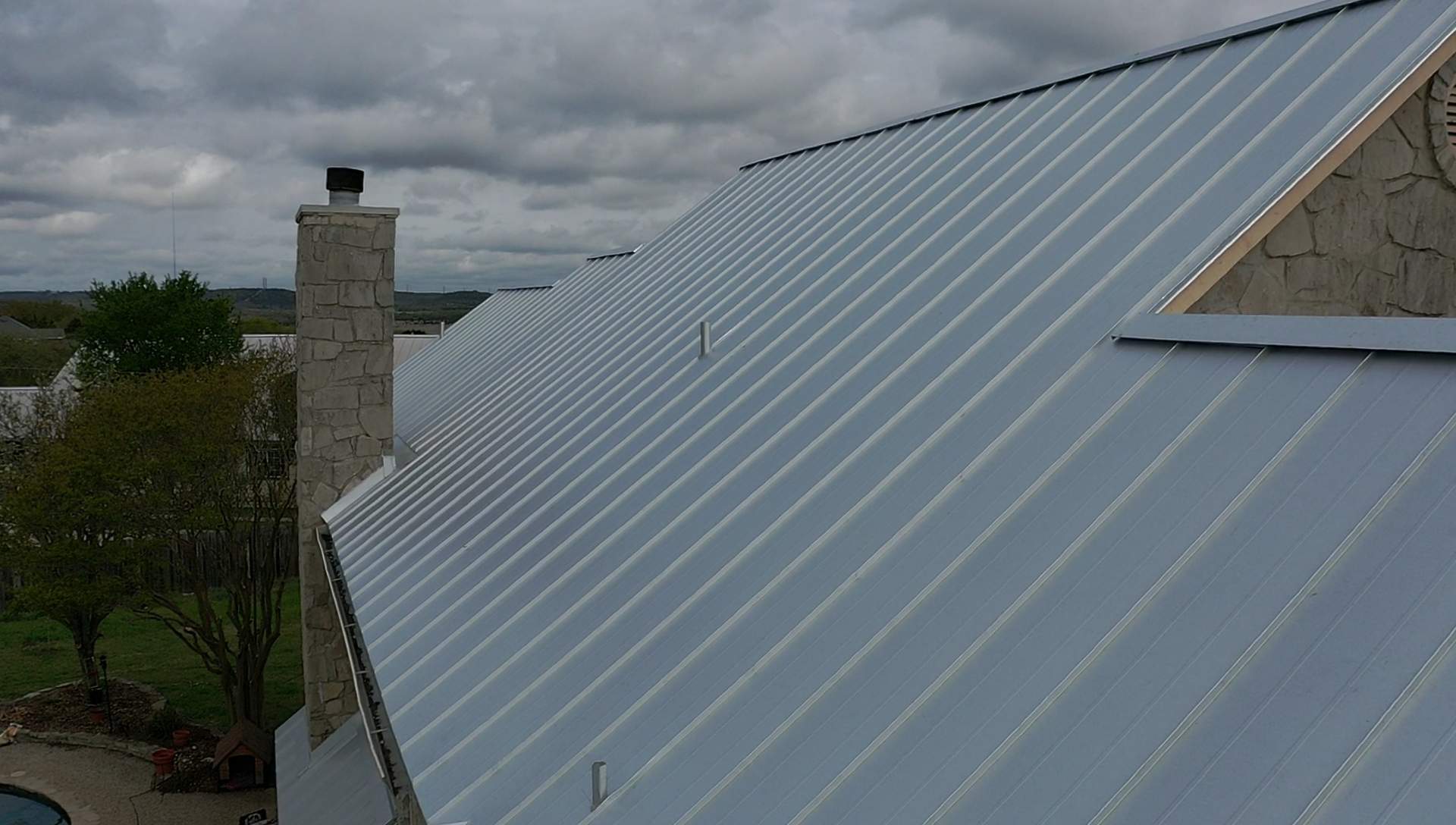 Residential Metal Roof Installation using McElroy Metal by Premier Roofing and Contracting