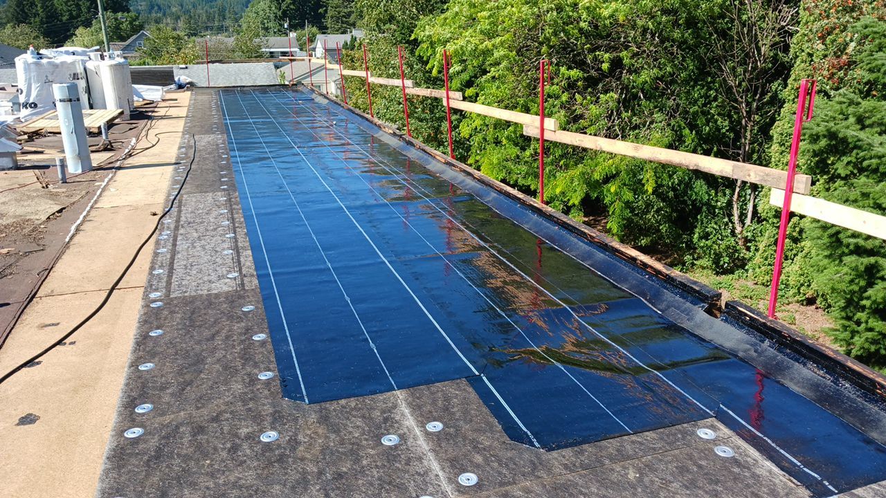 Residential ReRoofing Installation using IKO 2ply sbs  by Top Notch Roofing Inc