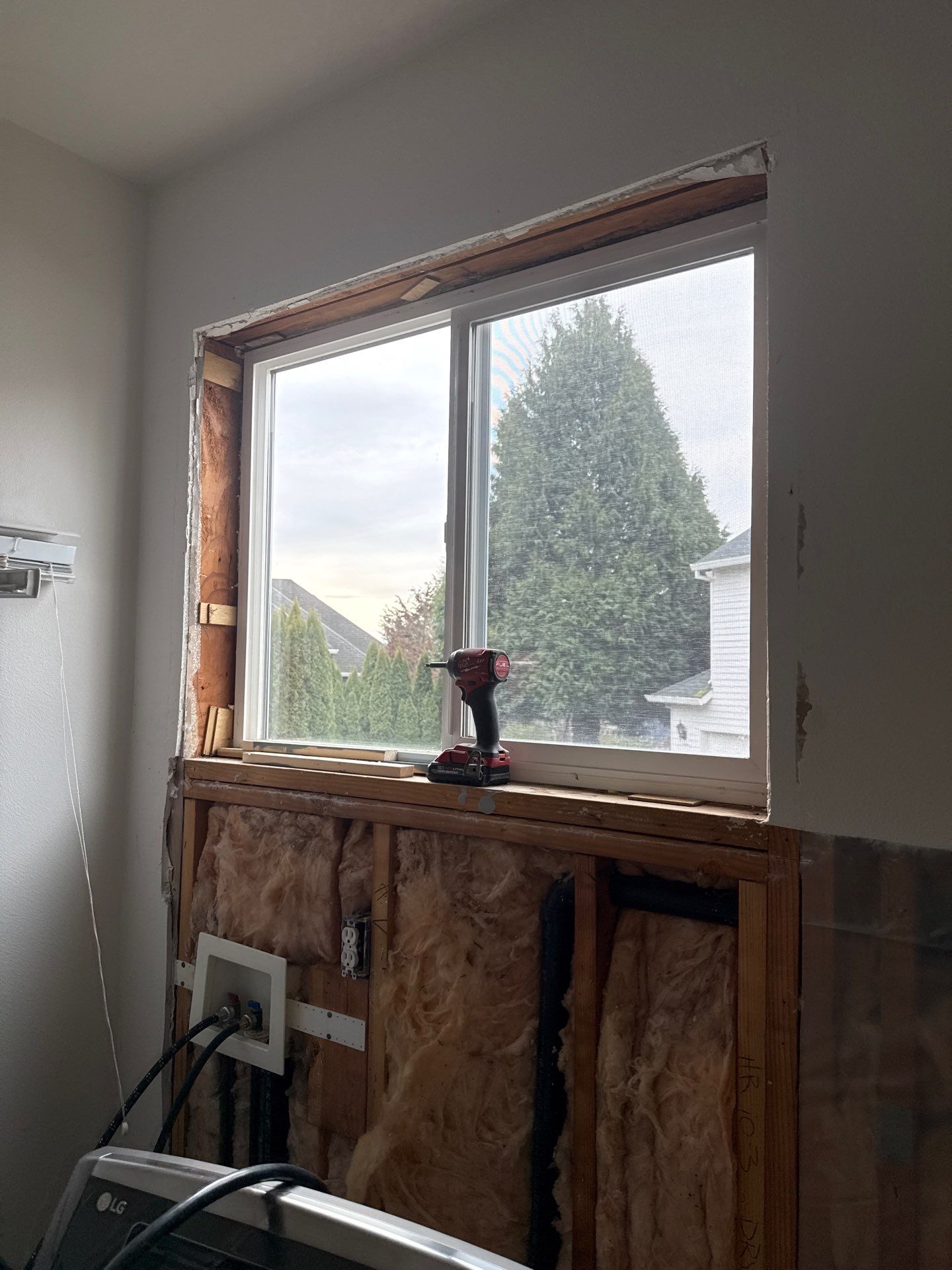 West Linn Laundry Room Renovation with New Cabinetry by American Made Construction 