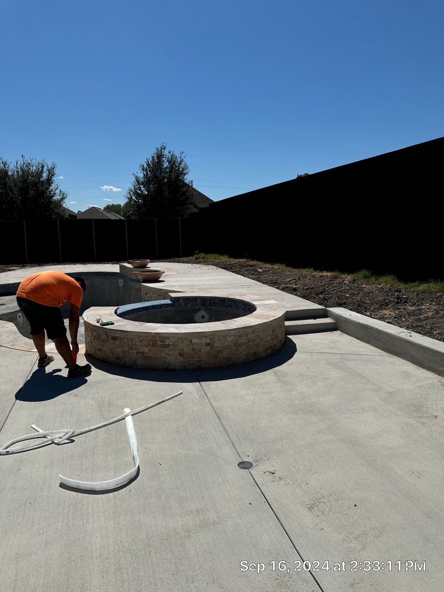 Freeform Pool with Raised Stone Spa by Pinnacle Pools and Spas - DFW