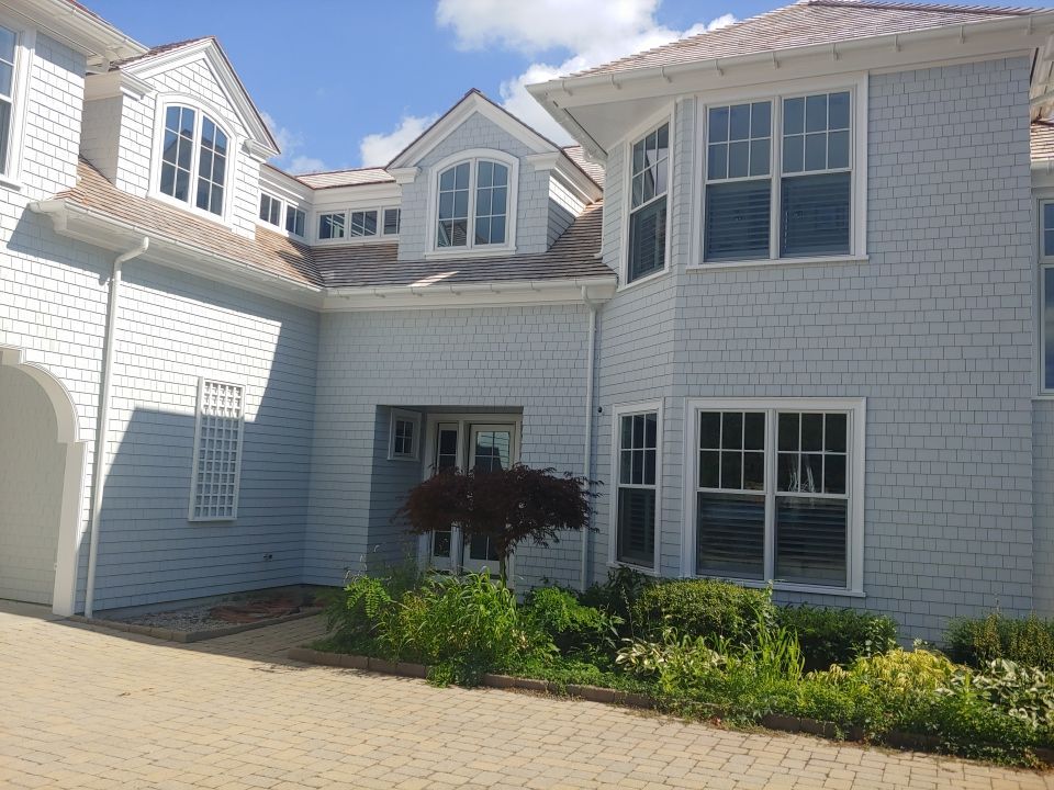 Gutter Installation using 6" Half Round Aluminum Gutter over Crown Moulding by Gutter Pro Enterprises