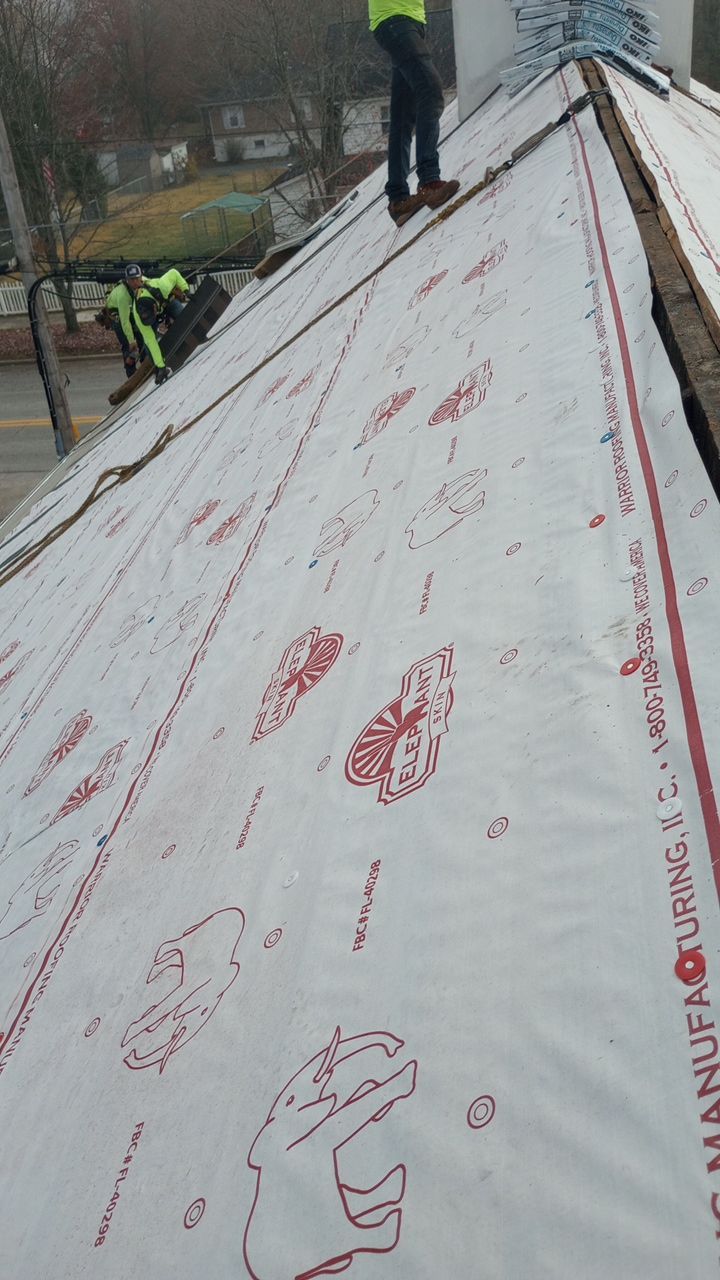 Commercial Roofing Installation using Performance Shingles by Mr. Roofer