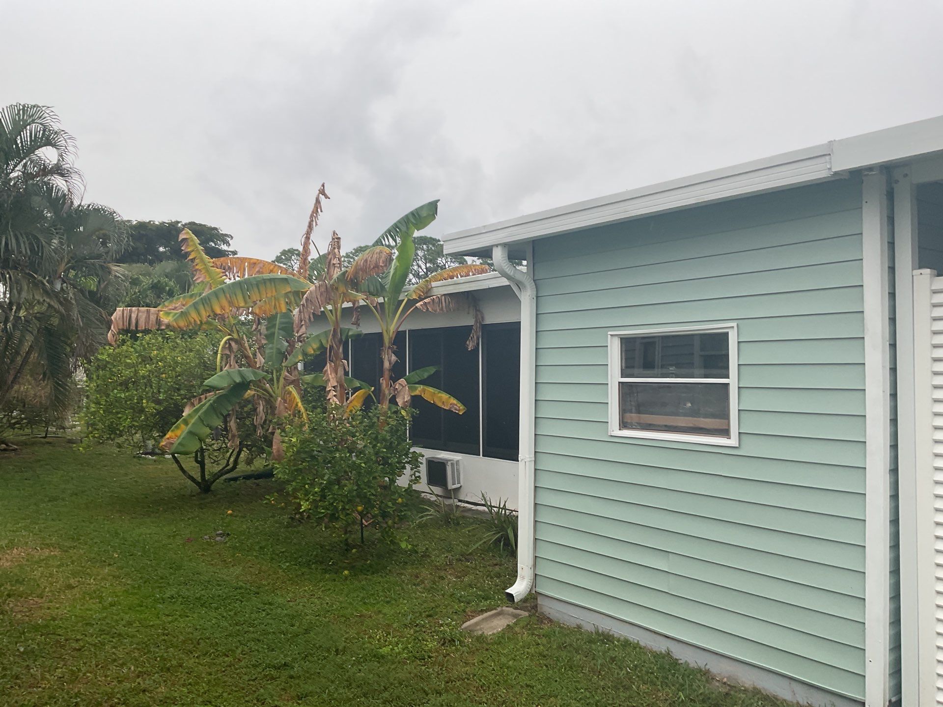 Cleaning Gutters in Fort Myers FL by Gutter Professors