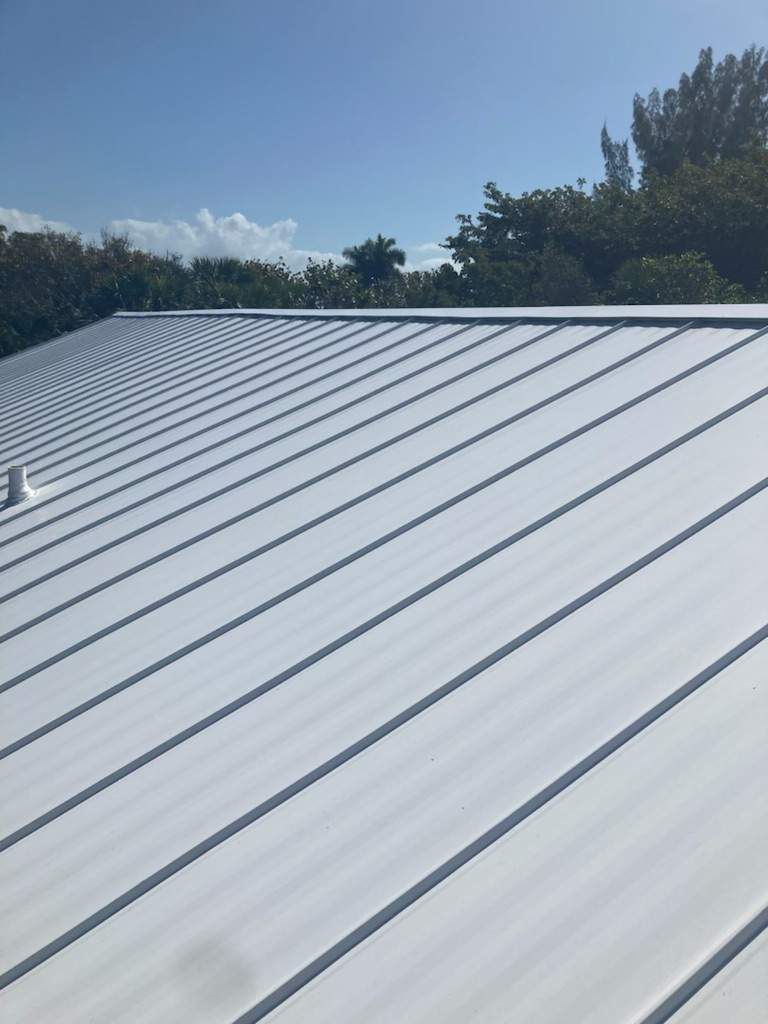 Residential Roofing Installation using Gulf Coast Metals Gulf Seam Panels by Four Peaks Roofing