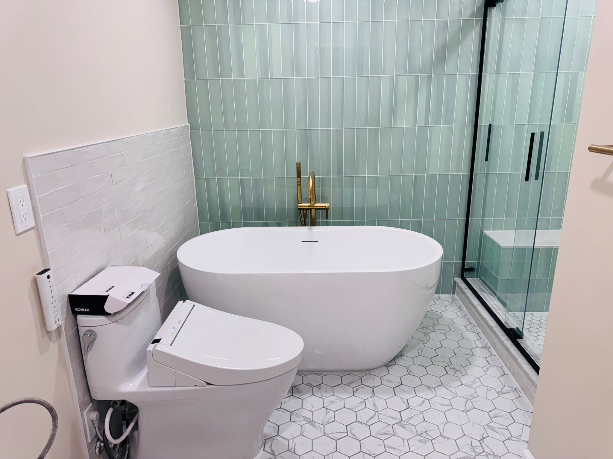 Bathroom Remodel using Tile by Home Concepts Construction