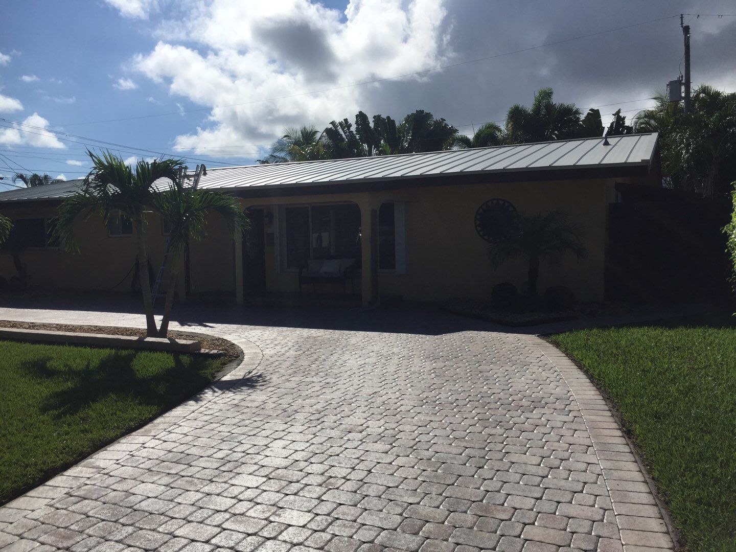 Residential Roofing Installation using 1" Nail strip metal roof by BLUES BROTHERS ROOFING