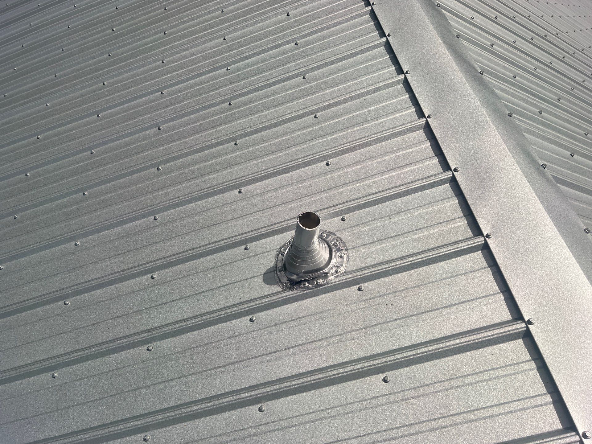 Residential Roofing Installation using Galvalume Classic Rib by Durabilis Roofing INC