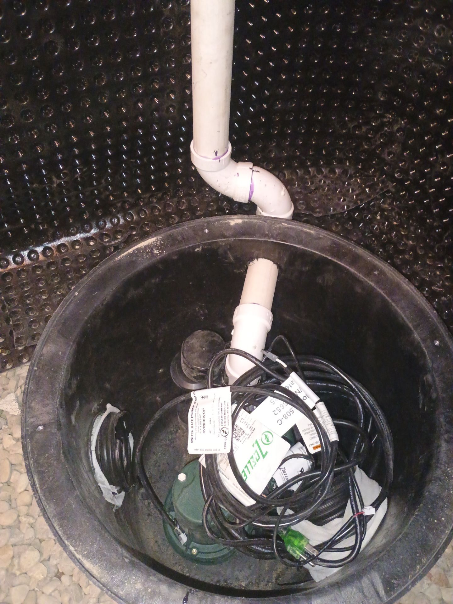Interior Drain Tile & Buried Discharge in South Minneapolis by Waterproofing Northeast