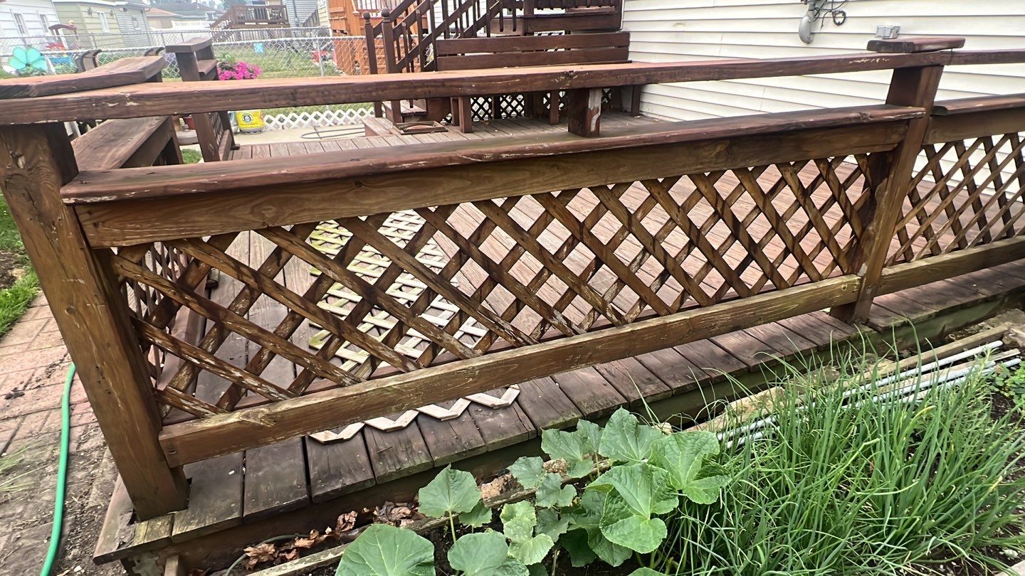 Wood cleaning and staining using Armstrong cloark oil stain by Northern Power Washing LLC.