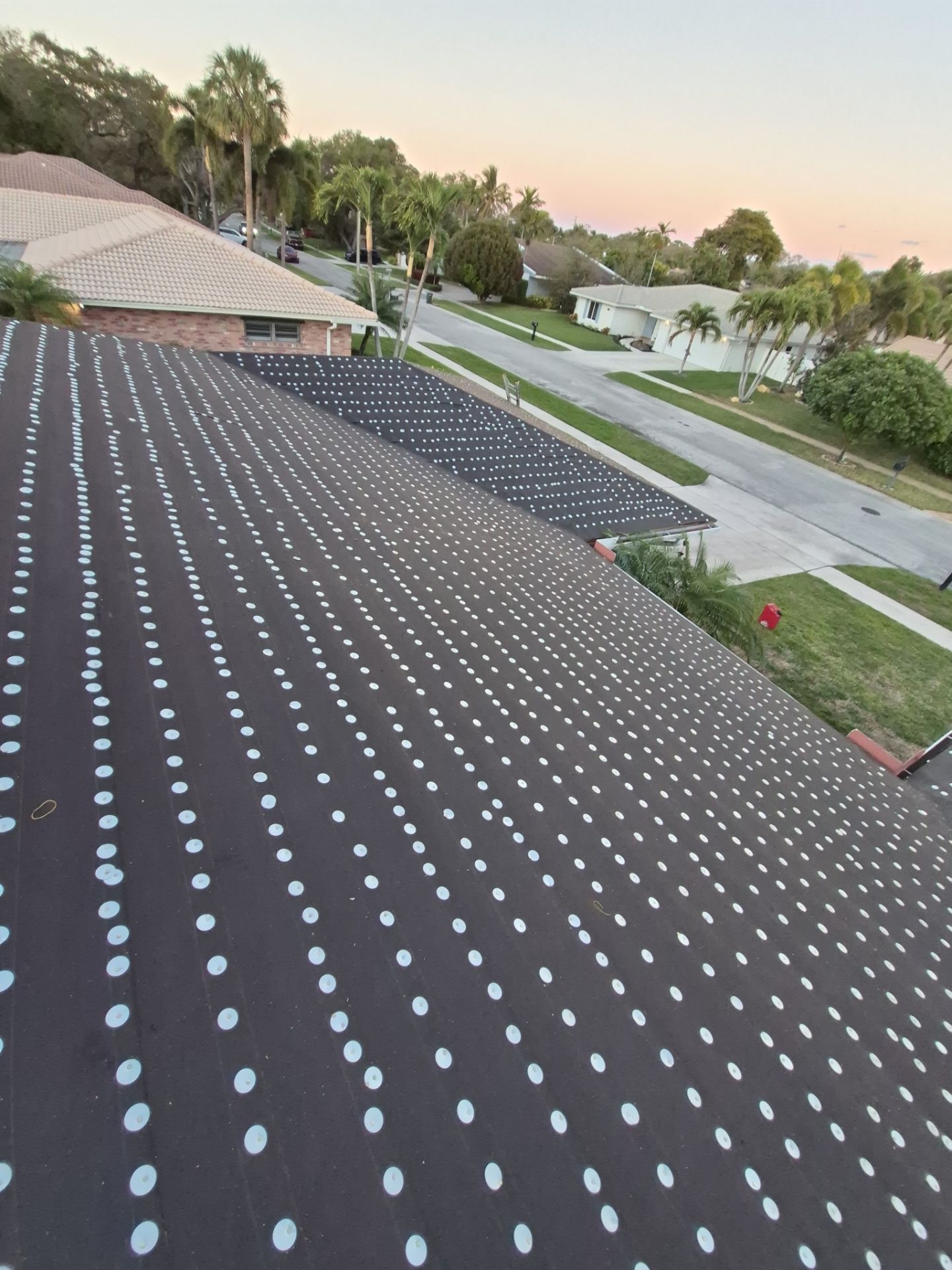 Residential Roofing Installation using 1" Nail strip metal roof by BLUES BROTHERS ROOFING