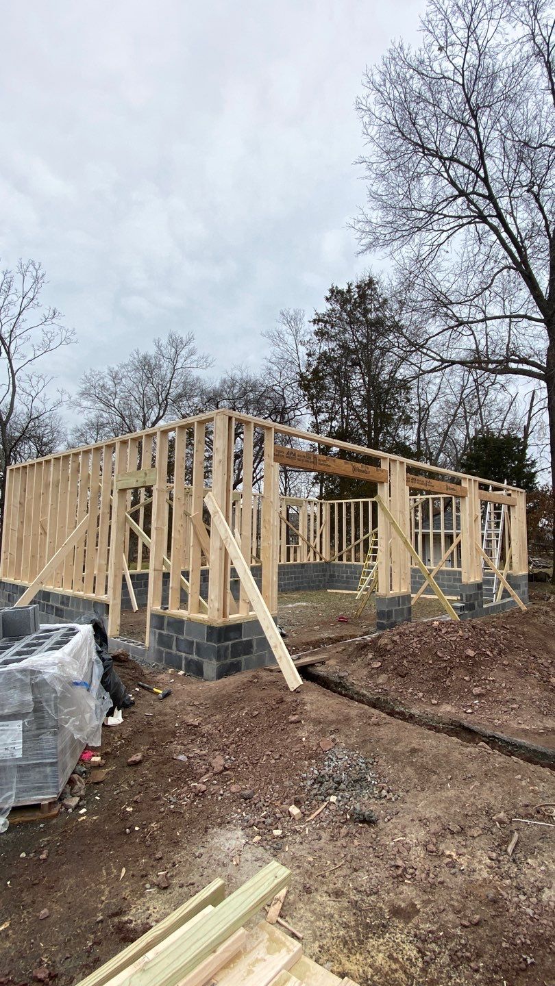 build car garage and efisienci room  using new construction by Jesus Master Handyman LLC 