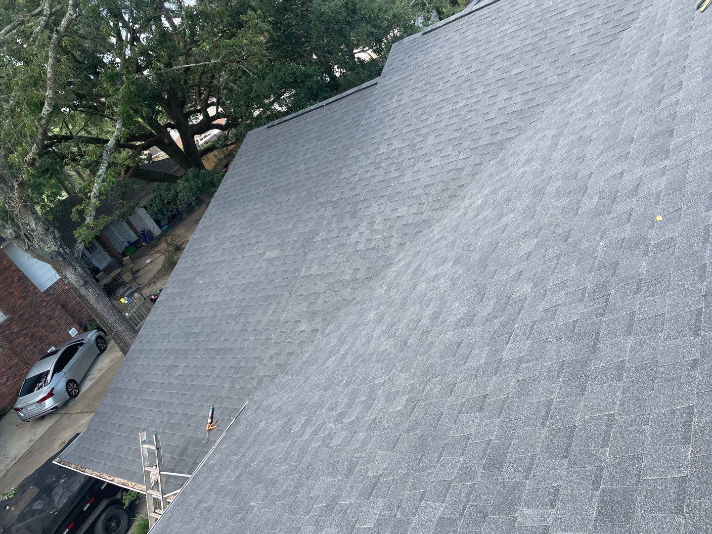 Residential Roofing Installation using Roof Replacement by American Roofing & Construction LLC