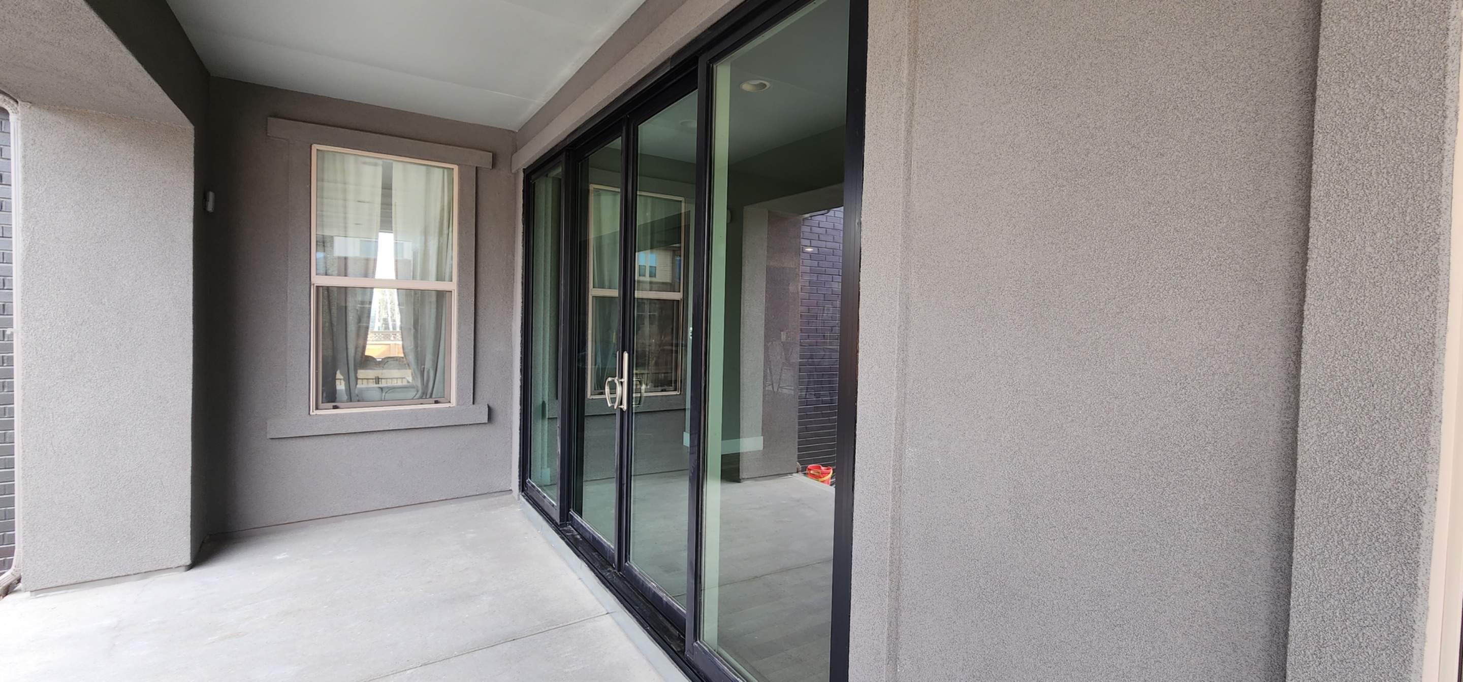 Open your space up to the outside! 4 Panel Patio door replacing 2 windows by 1st choice windows and siding