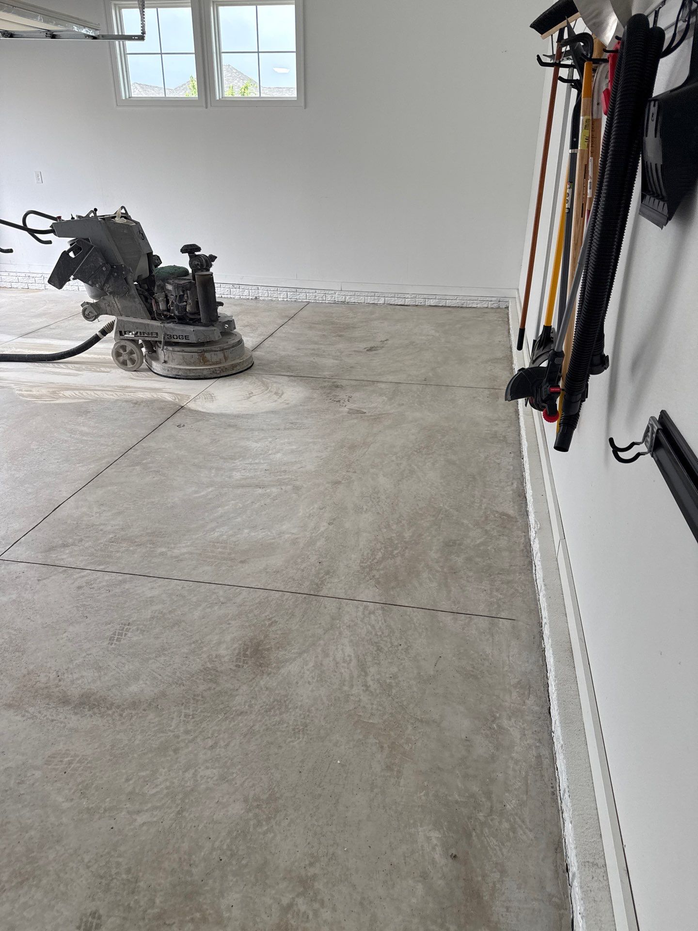 Gravel Flake Garage and Patio Floor Coating for Boone Residence by Revival Concrete Coatings