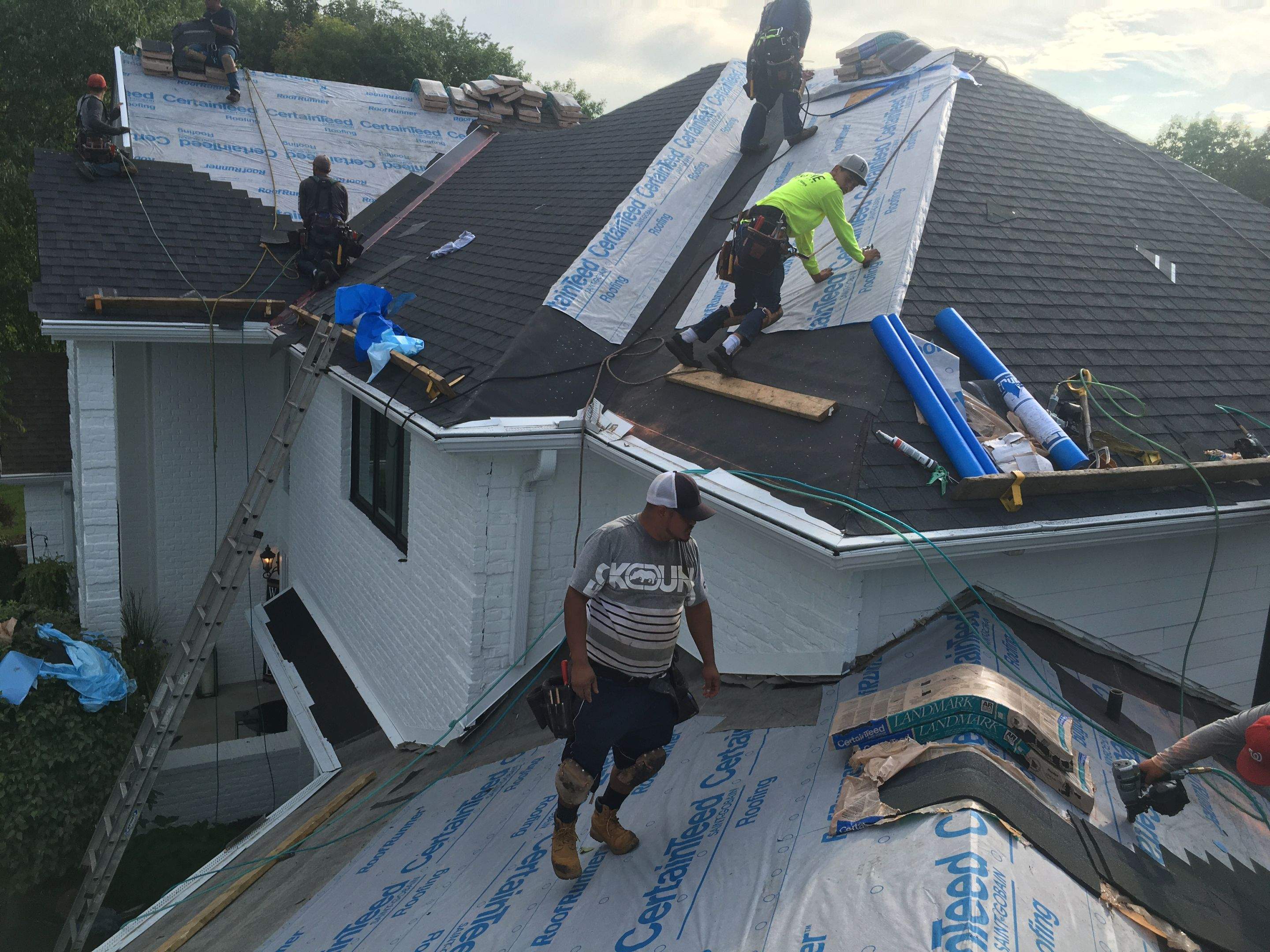 Residential Roofing Installation using Certainteed Landmark Moire Black by MODERN EXTERIOR SYSTEMS