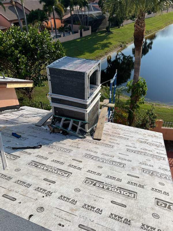 Complete Chimney Rebuild + Tile & Flat Re-Roof  by Morton Roofing, Inc.