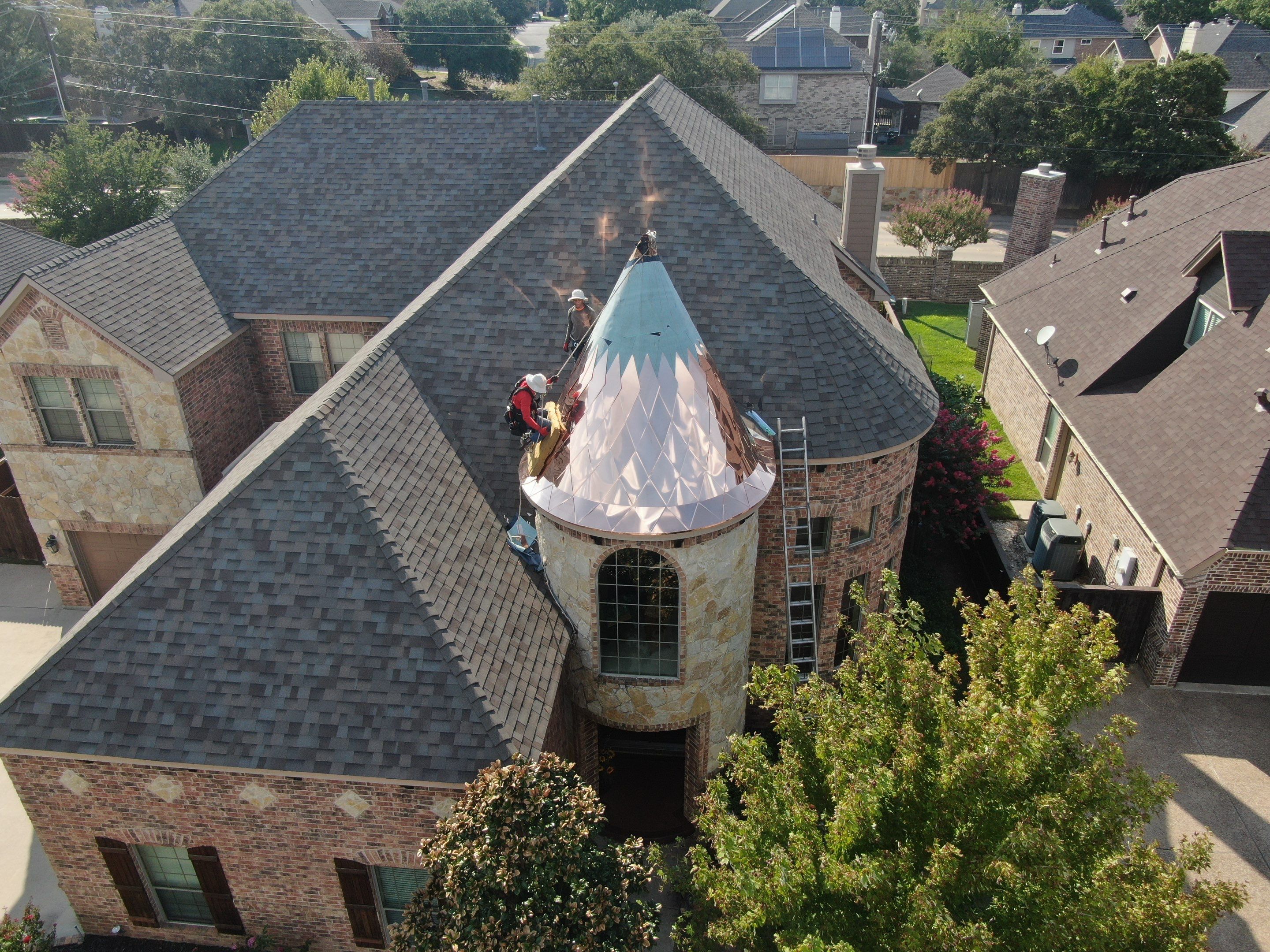 Installing Custom copper turret and Malarkey Vista Class 4 shingles Hail Damage Upgrade by Becker Roofing and Exteriors