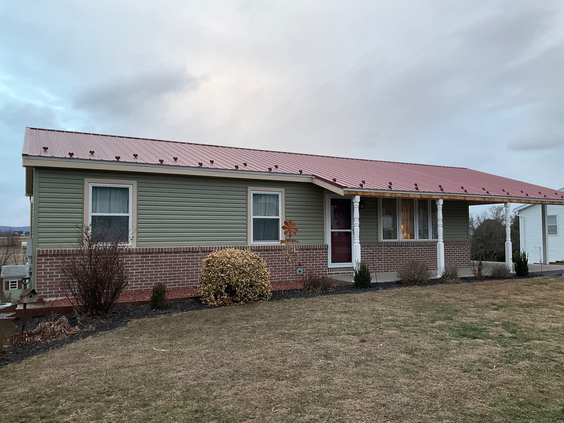 Vinyl Siding Replacement and Patio Door Installation in Elizabethville by Esh Builders