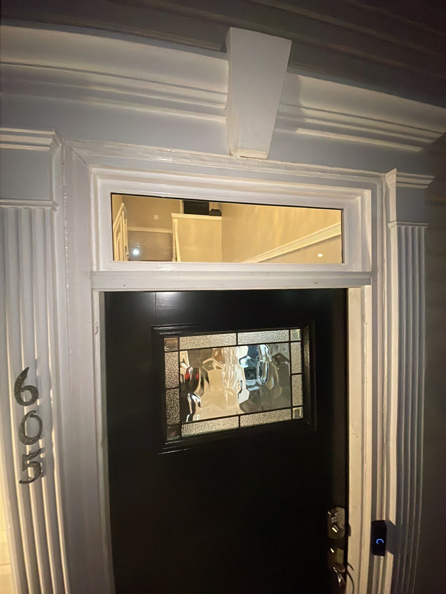Exterior Installation using Transom Window & Door by A1 NERDY HOMES LLC