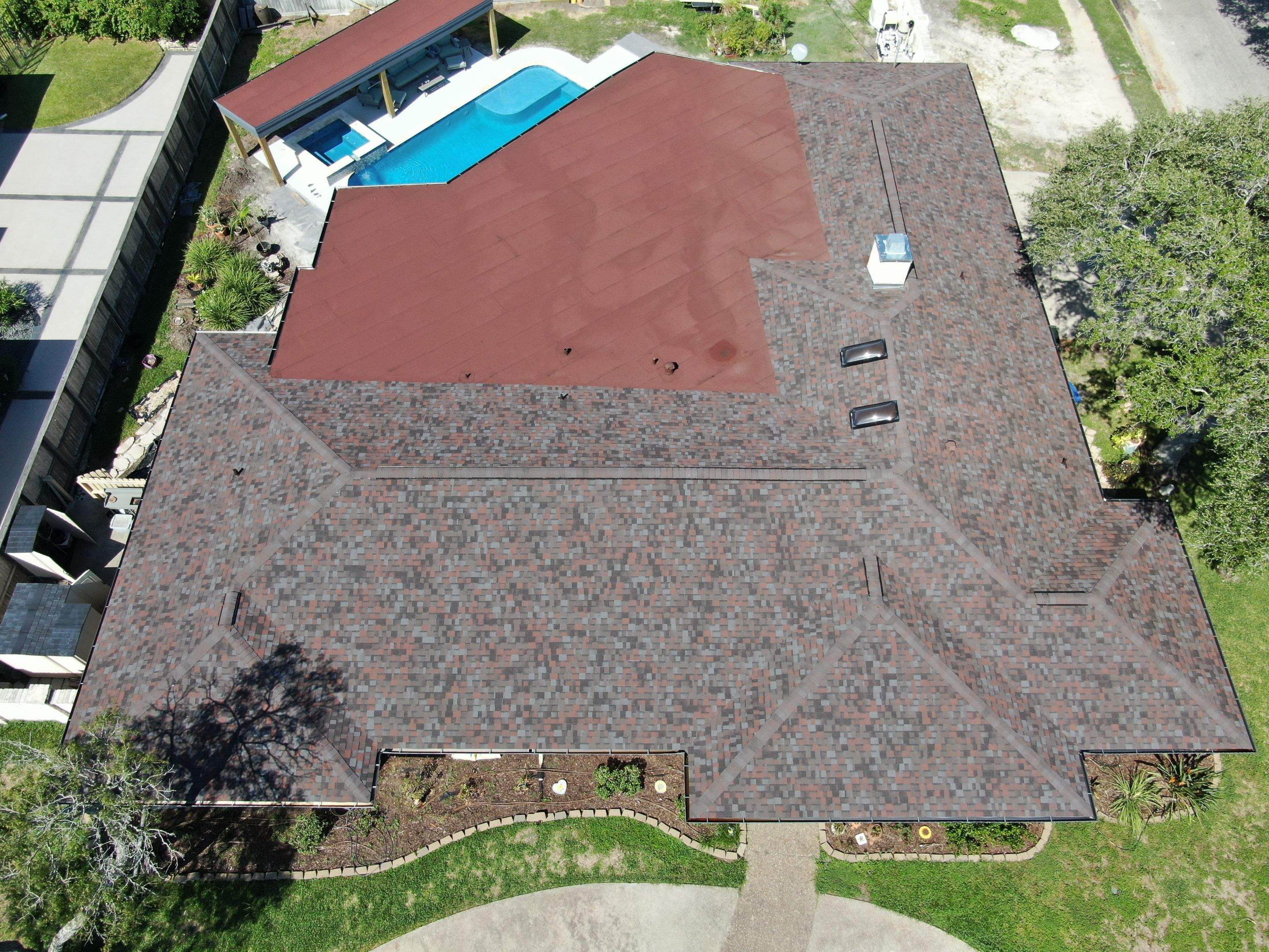 Beautiful pool side build by Bayfront Roofing and Construction