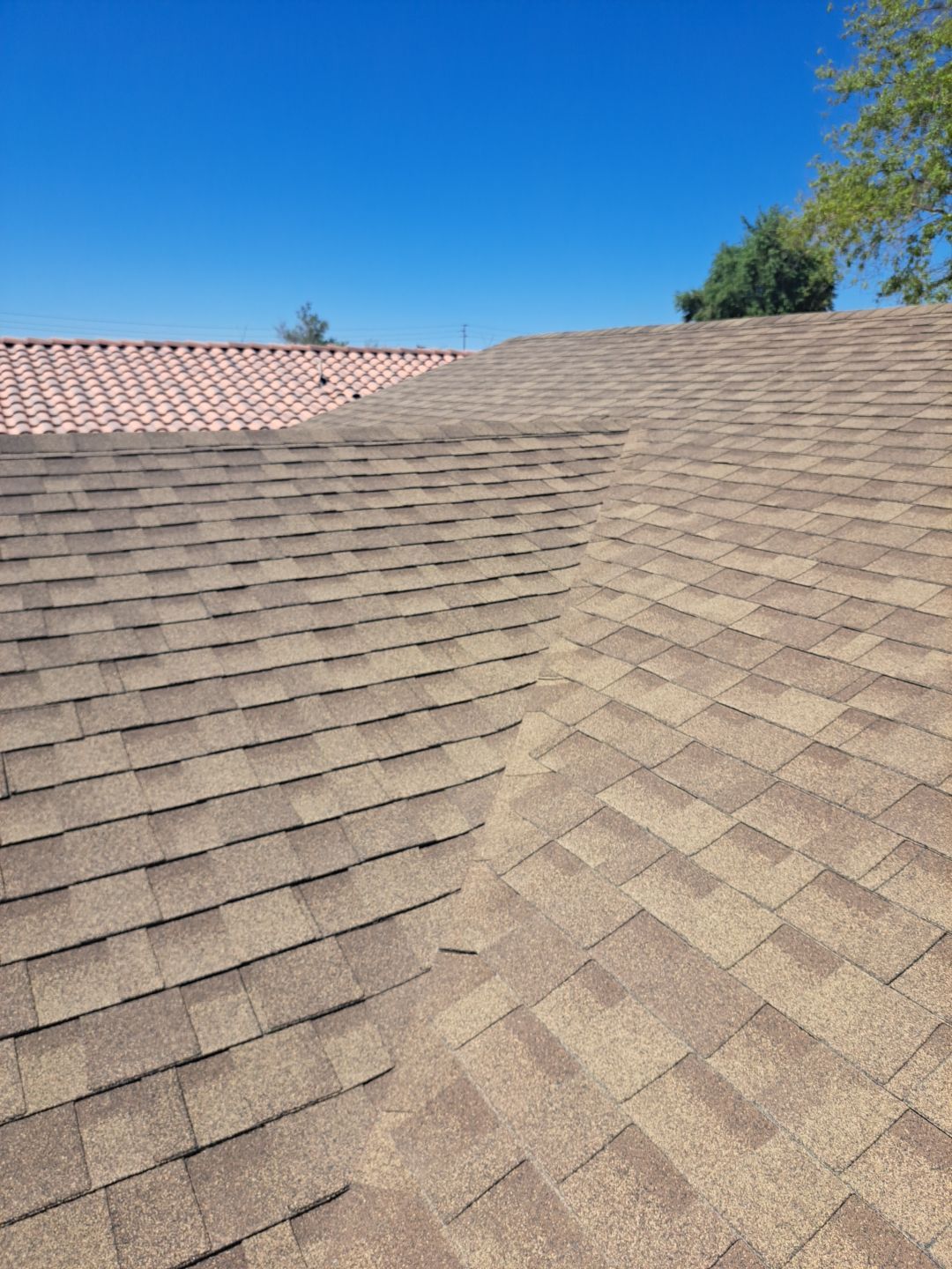 Estate Gray Shingles by Reimagine Roofing