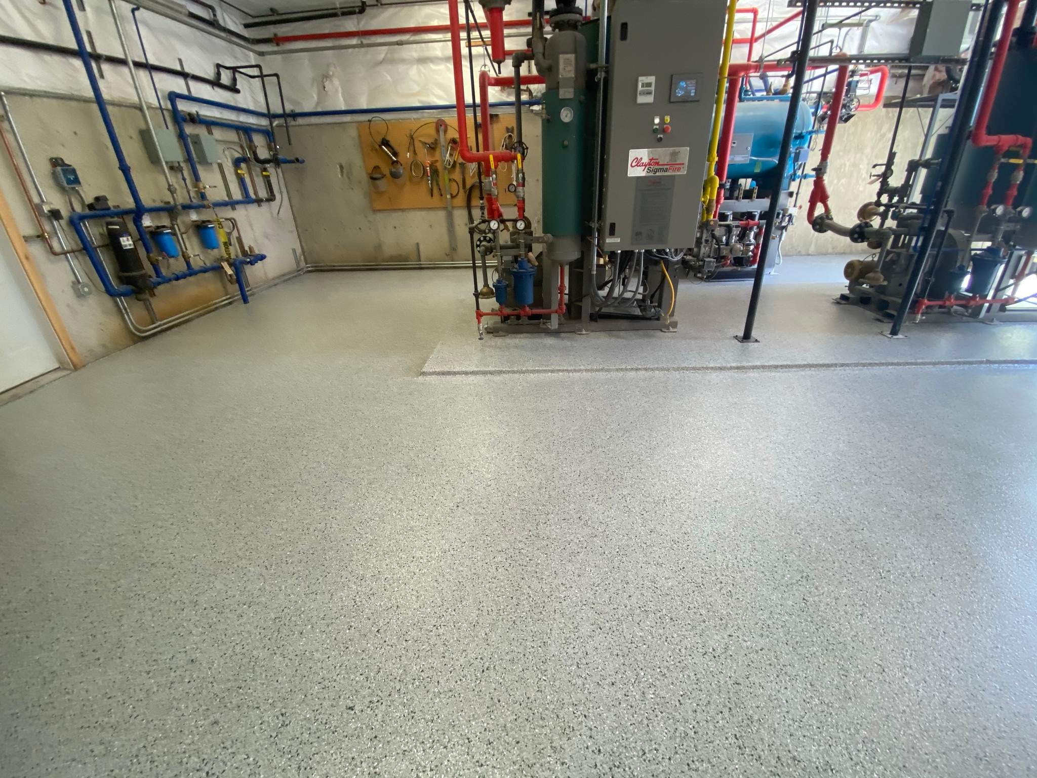 Commercial Floor Transformation using North Pole with Green by Croc Coatings, LLC