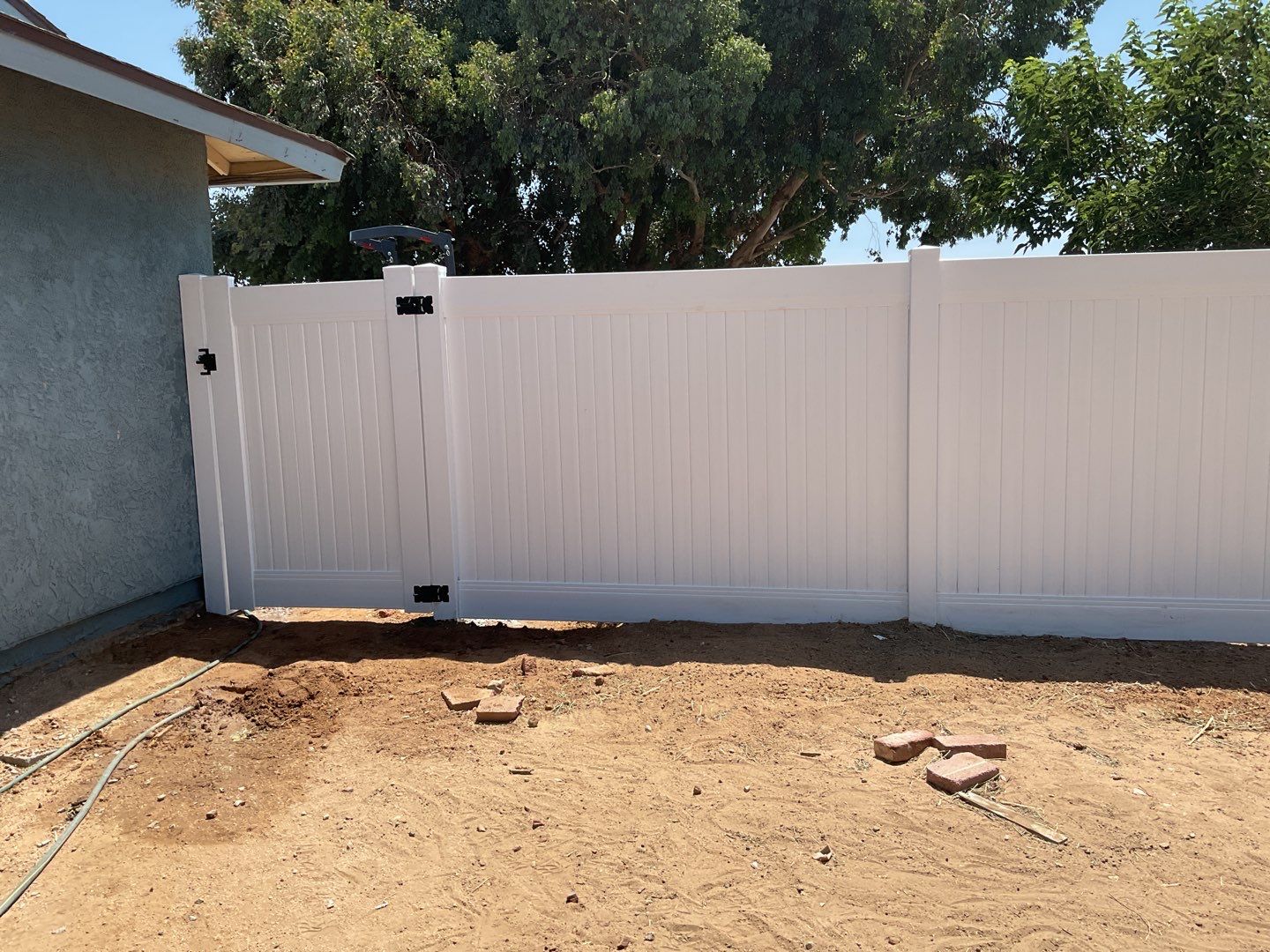 Fence replacement using 6ft and 4ft vinyl  by Fence Guys Inc. 