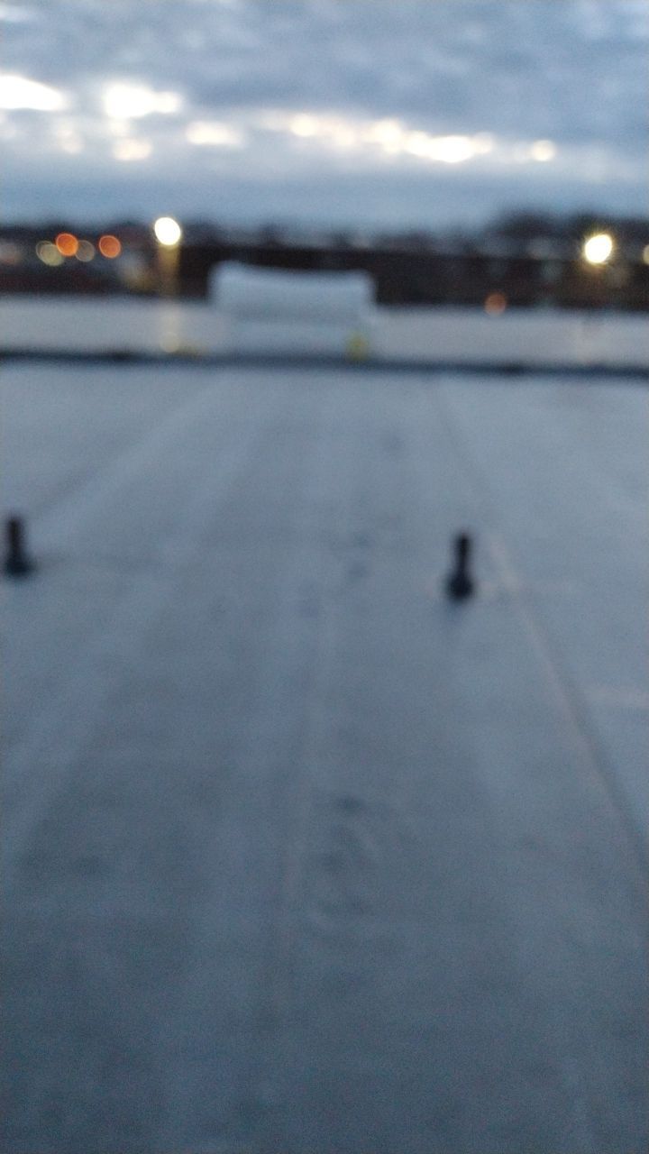 Commercial flat roof parma by Absolute Roofing and Construction