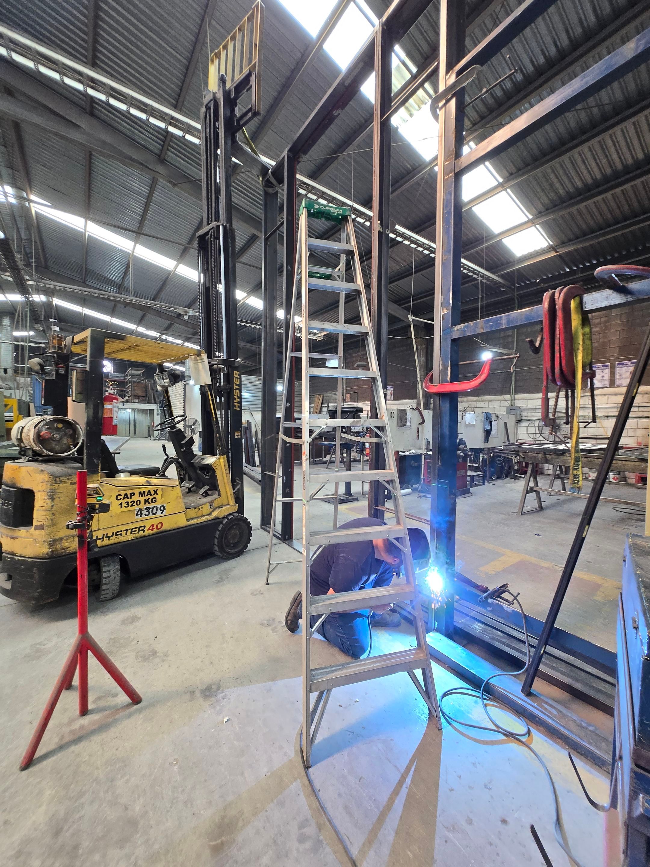 Custom Pivot Door and Structural Steel Frame Installation in Fort Worth by Solara Custom Living